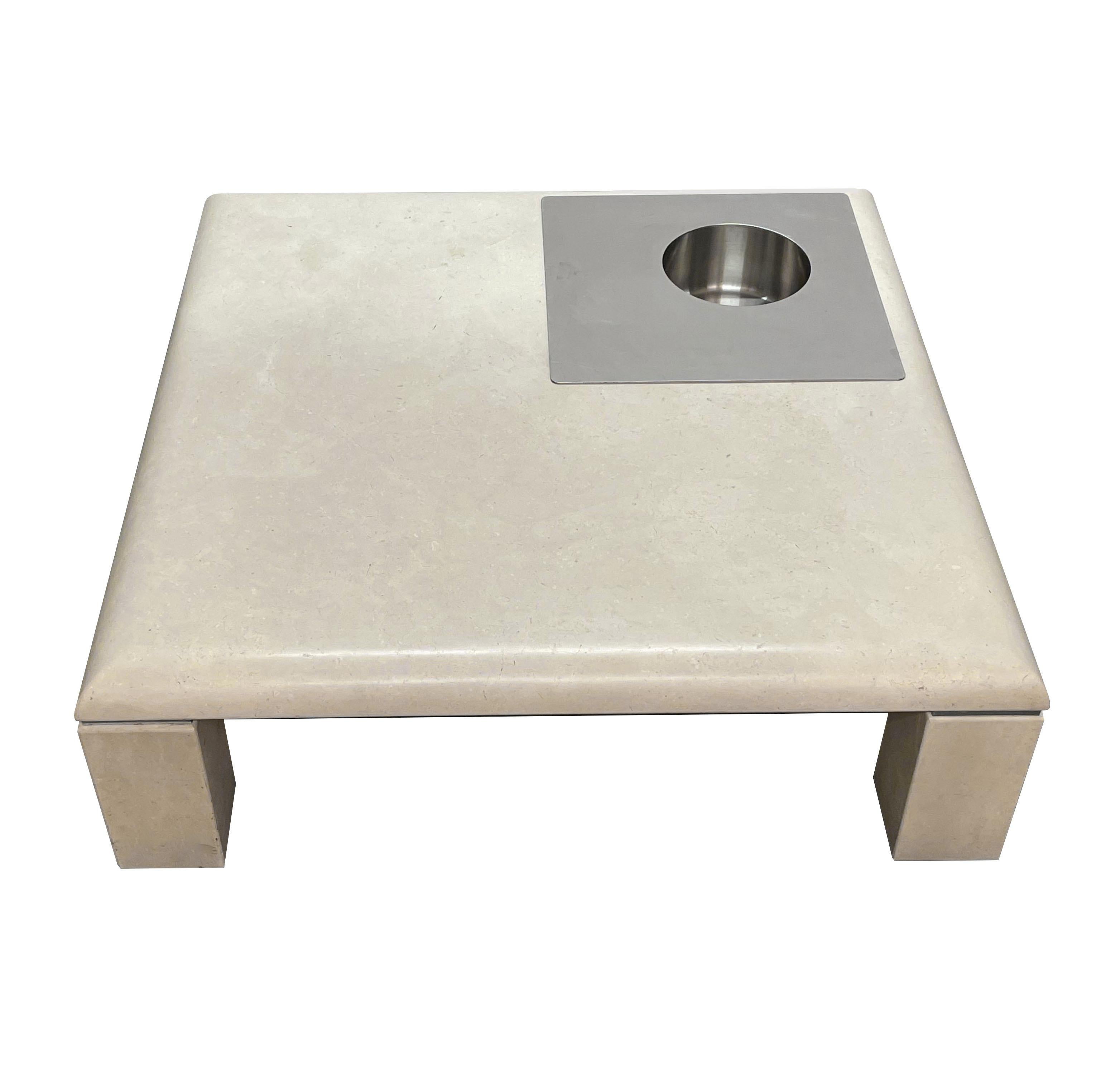 Midcentury squared coffee table in white Botticino marble and steel bottles or objects holder. This outstanding item was designed in Italy during the 1970s in the style of Willy Rizzo.

This coffee table is unique as it is made of white Botticino