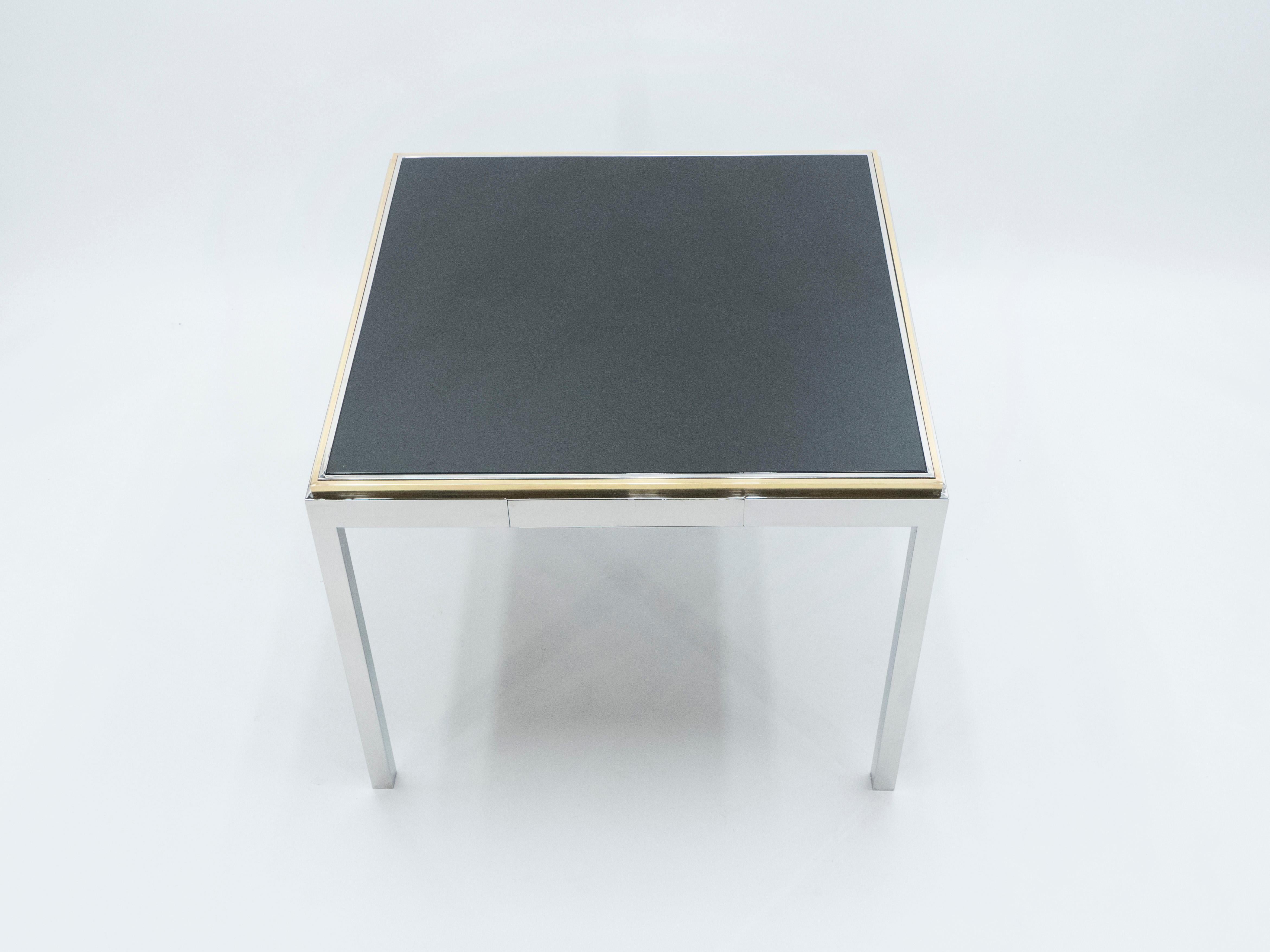A rare Flaminia game table by Willy Rizzo, it has a double sided surface, one side is a shining black lacquered top, the other side is brown Suede leather as a playing surface. Following the glamorous Italian midcentury look of other Classic Willy