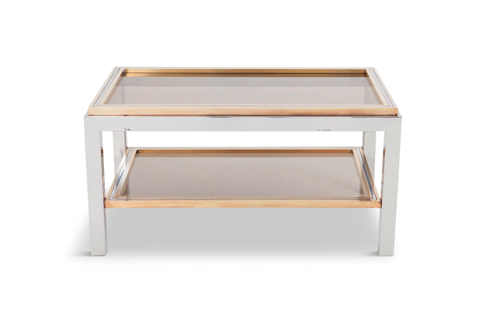 Brass, chrome and smoked glass rectangular coffee table by Willy Rizzo, 1970s.

This two-tier table is designed with a chrome-plated steel frame and wonderful brass edges
A well known design of the master, the rich contrast in materials make this