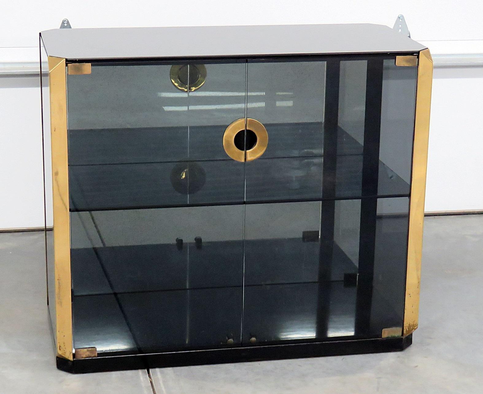 Willy Rizzo Mid-Century Modern smoked glass display cabinet with brass accents, mirrored top, and 1 glass shelf.