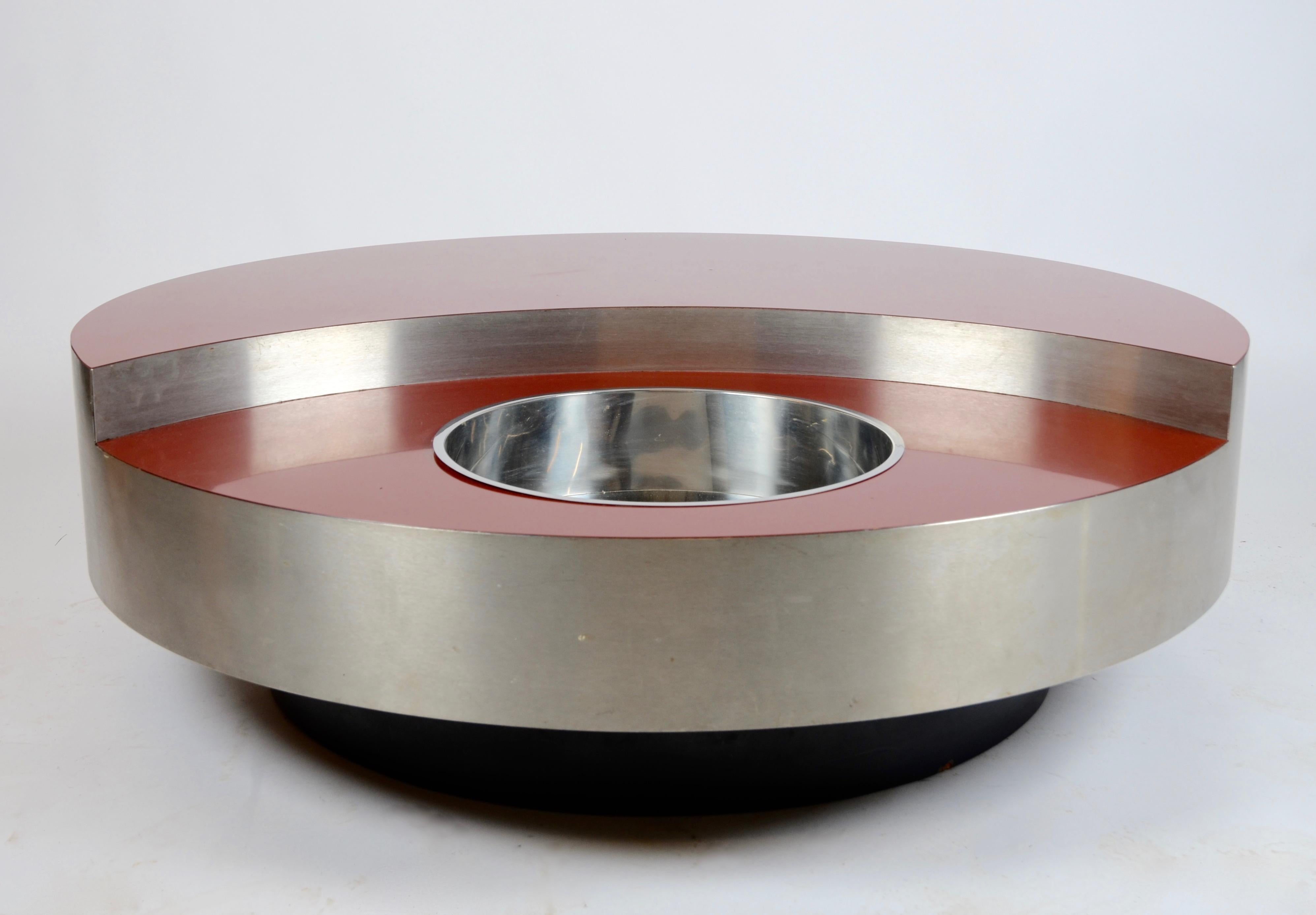 Large model of TRG or Tavolo Rotondo Girevole, revolving coffee or cocktail table with ice bucket. Designed in 1967 by Willy Rizzo. Manufactured by Studio Willy Rizzo, 1970s. Red lacquer and stainless steel.