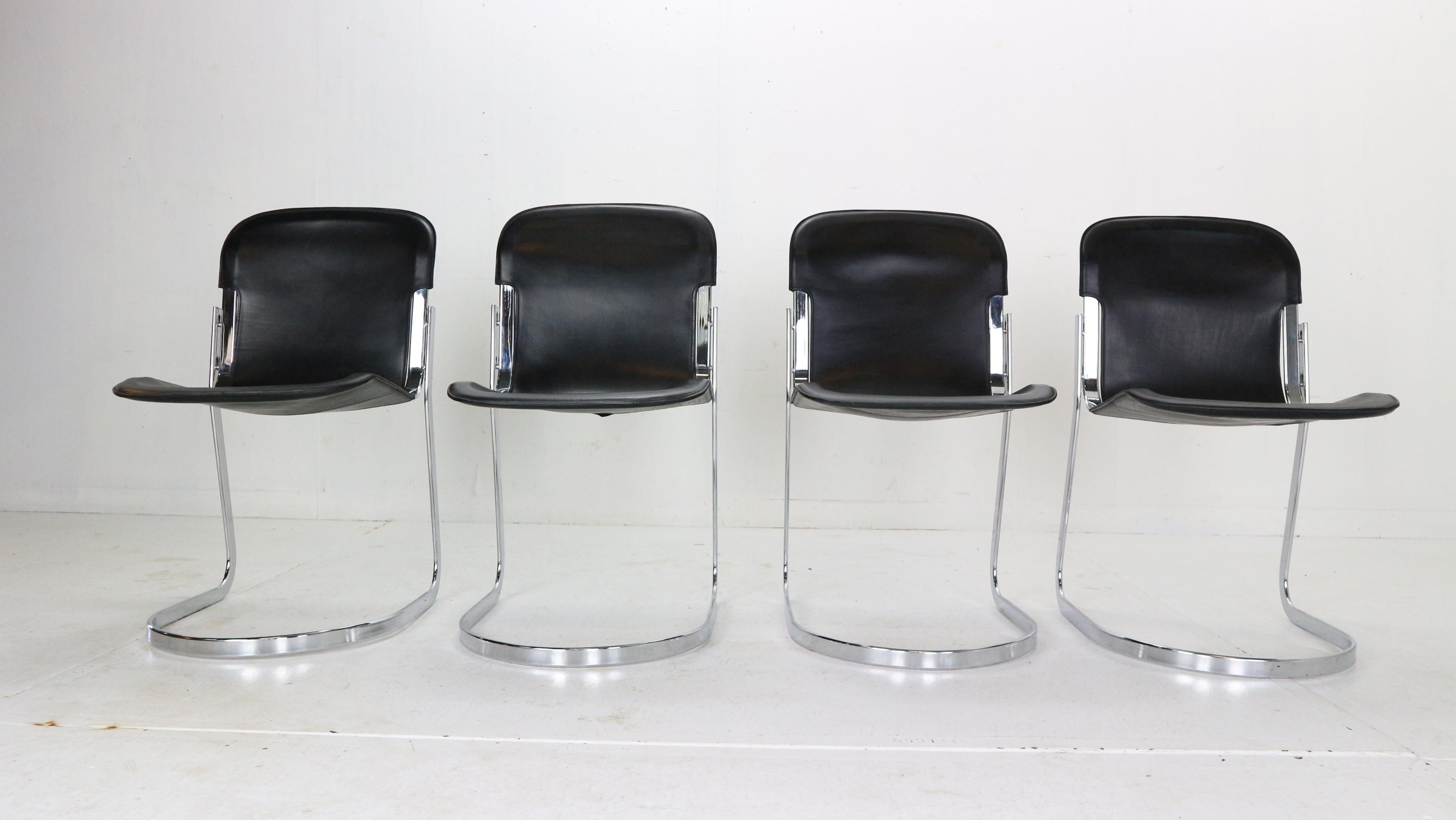Set of four dinning room chairs designed by Willy Rizzo and manufactured by Cidue in 1970's period Italy. 
Model No: C2.
These cantilever chairs have a flat chromed tubular steel frame and are covered with high quality Italian black saddle