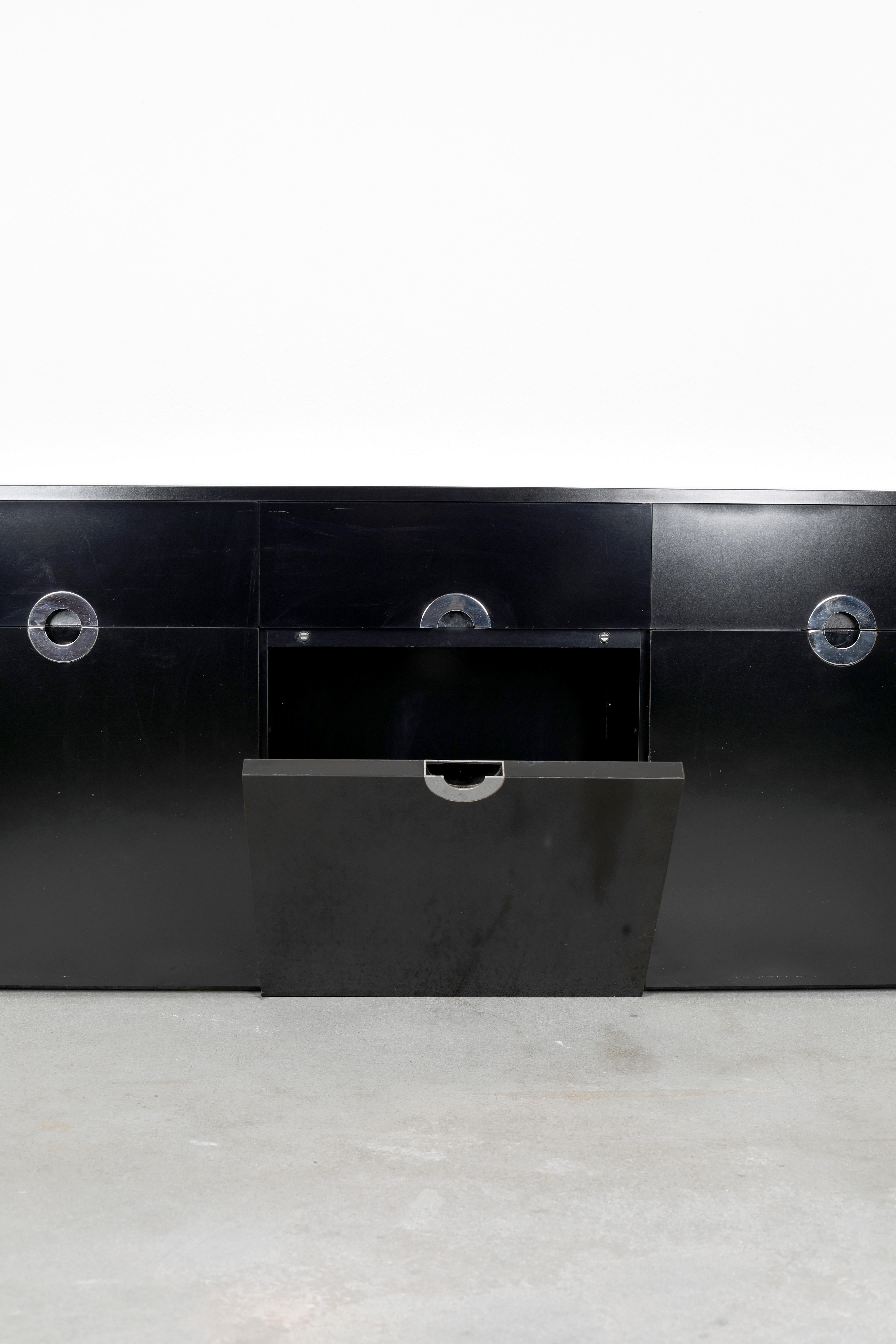 Willy Rizzo Sideboard, Produced in Italy, 1970s

Introducing a stunning Willy Rizzo sideboard from the 1970s, a perfect blend of elegance and functionality that epitomizes the luxurious Italian design of the era. Renowned for his distinctive style,