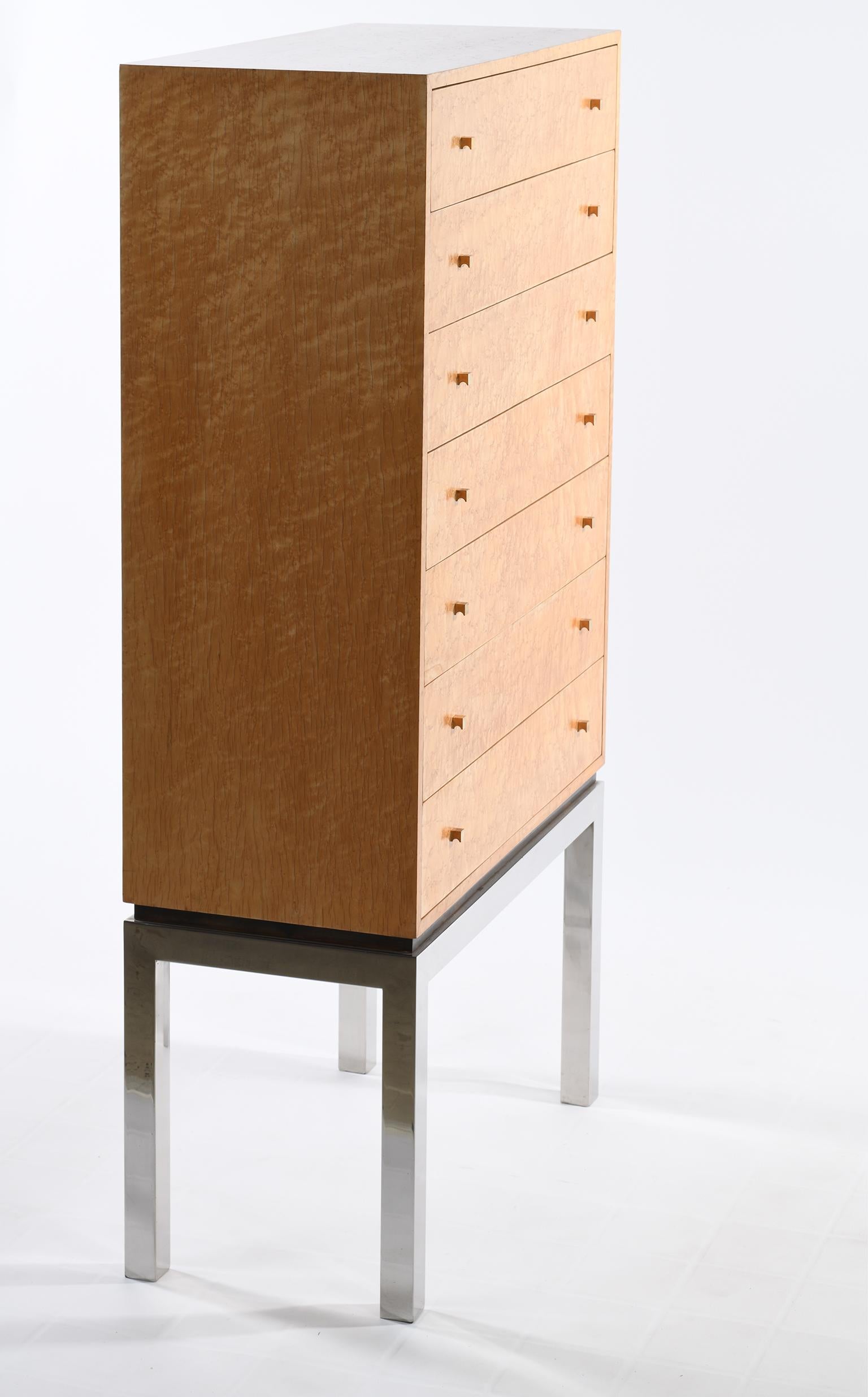 Chest of drawers designed by Willy Rizzo, made in Italy, midcentury, with beautiful and luxurious bird eye maples in a light and warm color, also finished behind with the same wood so that it can also be placed in the center of a room.
This cabinet