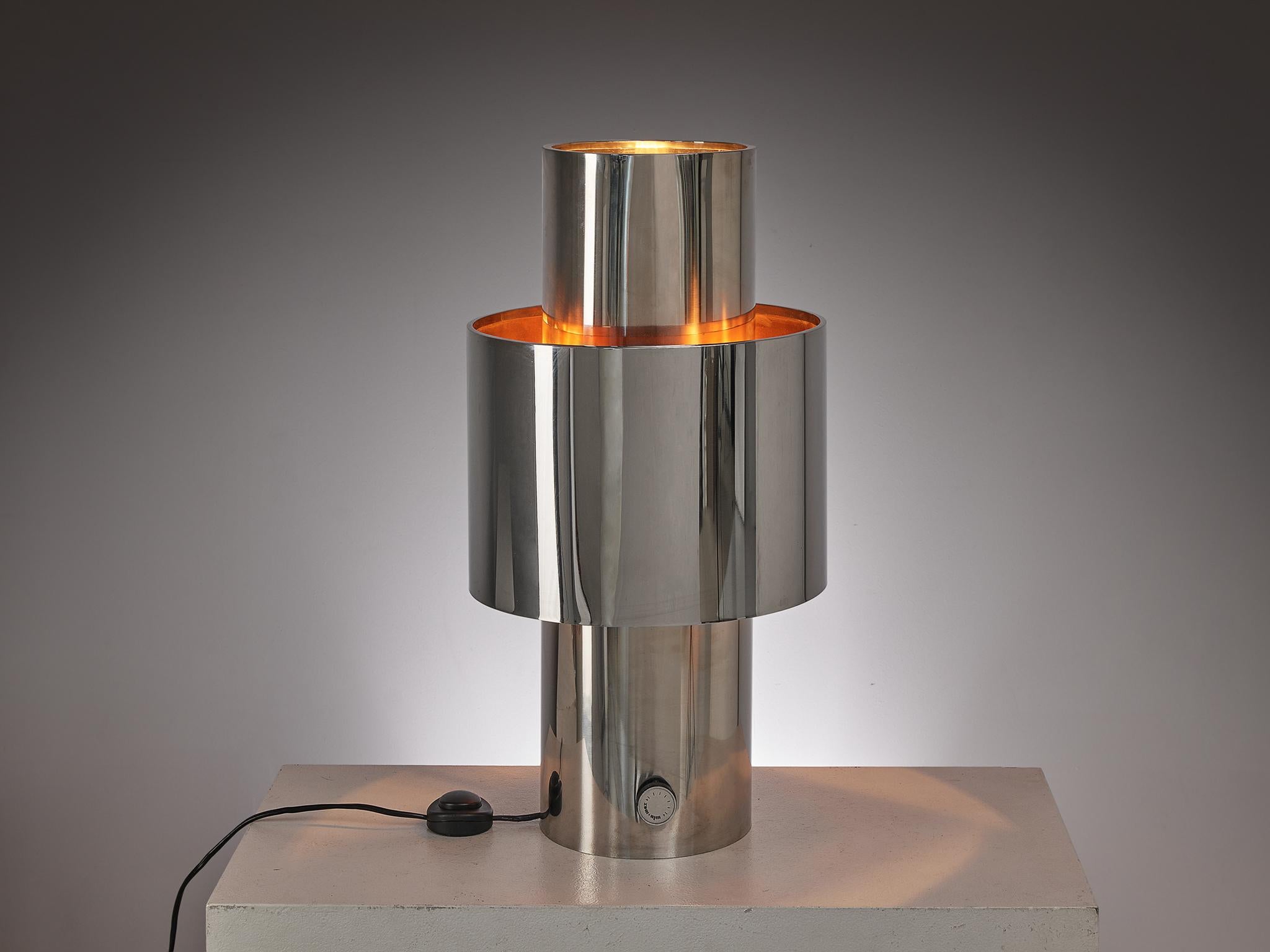 Willy Rizzo, table lamp, model 'Love', chrome, copper, plastic, Italy, circa 1971.

This unique table lamp is designed by Italian designer Willy Rizzo in the early 1970s. The design is mainly carried out through a repetition of cylindrical shapes
