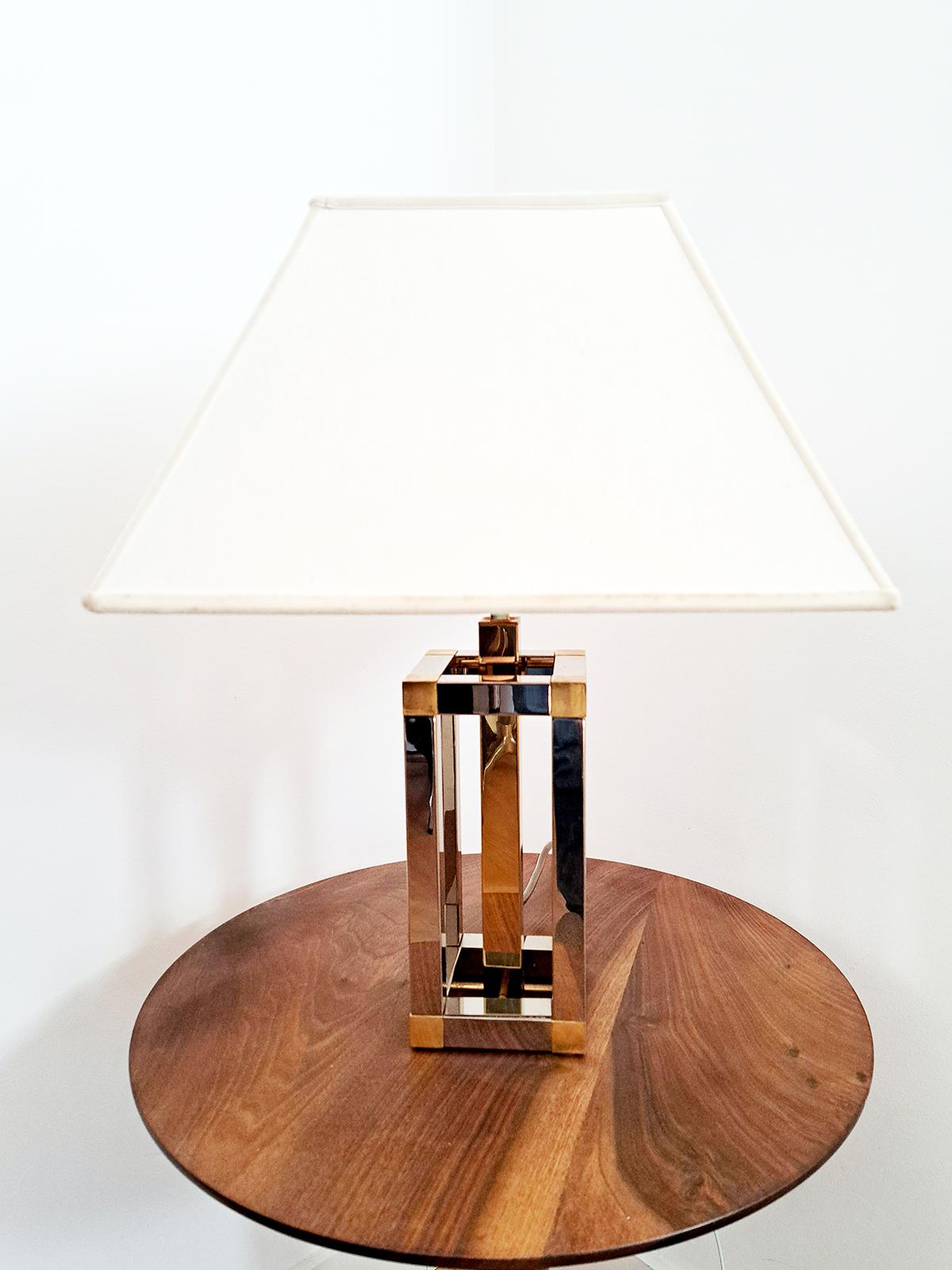 Decorative table Lamp attributed to Willy Rizzo, Italy, 1970s 
The geometric cube base is made of gold-plated and chromed metal.
The lamp is in good condition, with signs of age and use. Only the small one is available in the photo. Rewired using