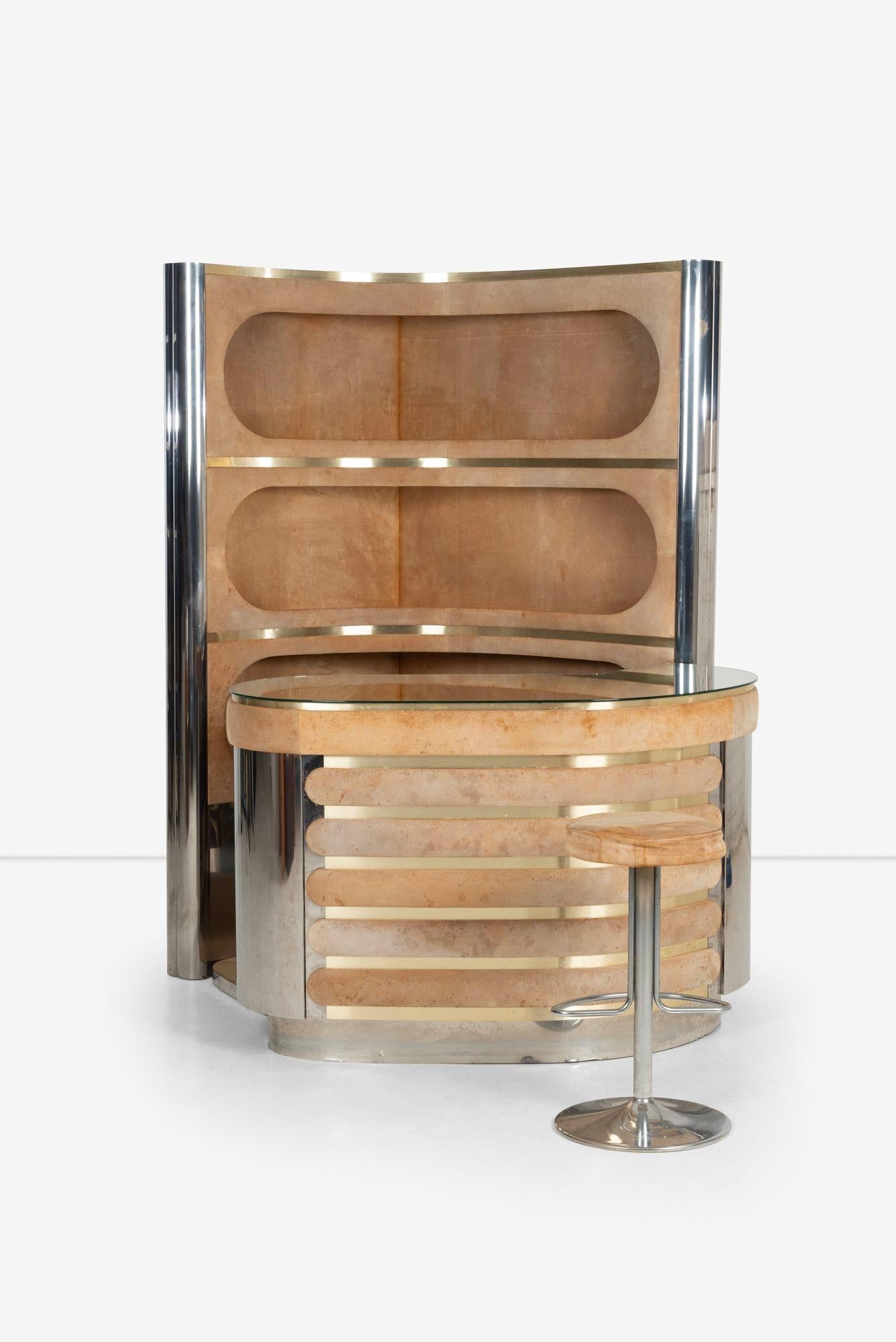 Willy Rizzo Three-Piece Bar Set with Counter Stool, 1970s Italy: Features suede and chrome bar set with original mirrored counter and storage, three wide shelves with working lights, an original refrigerator, and a counter barstool. Includes cognac