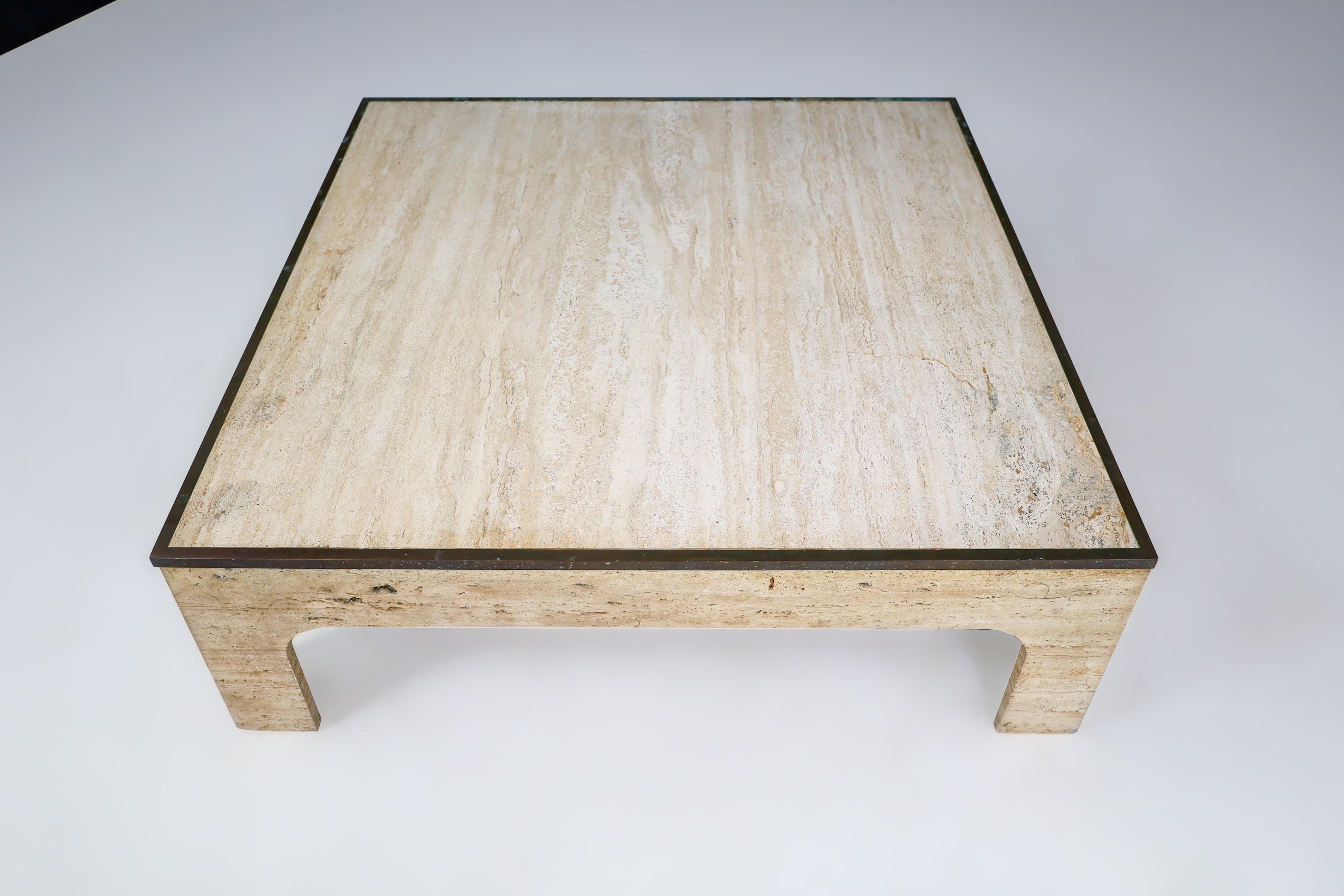 Willy Rizzo Travertine and Patinated Brass Coffee Table Italy 1970s 

This is a Hollywood Regency-style travertine coffee table designed by Willy Rizzo in Italy during the 1970s. The table top is square and made entirely of travertine, while the