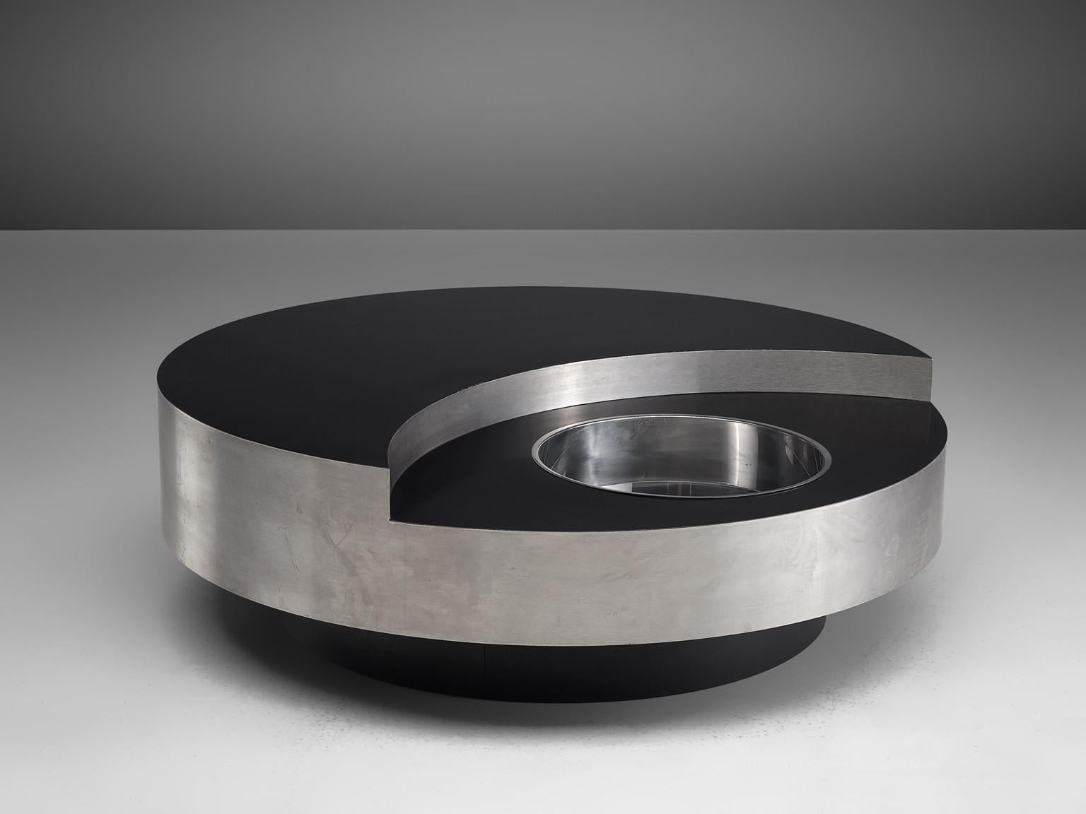 Willy Rizzo, coffee table, metal and lacquer, 1970s, Italy.

This iconic cocktail table is designed by Willy Rizzo. His cocktail tables are amongst his most prolific and therefore most wanted objects. This particular piece is exemplary for the