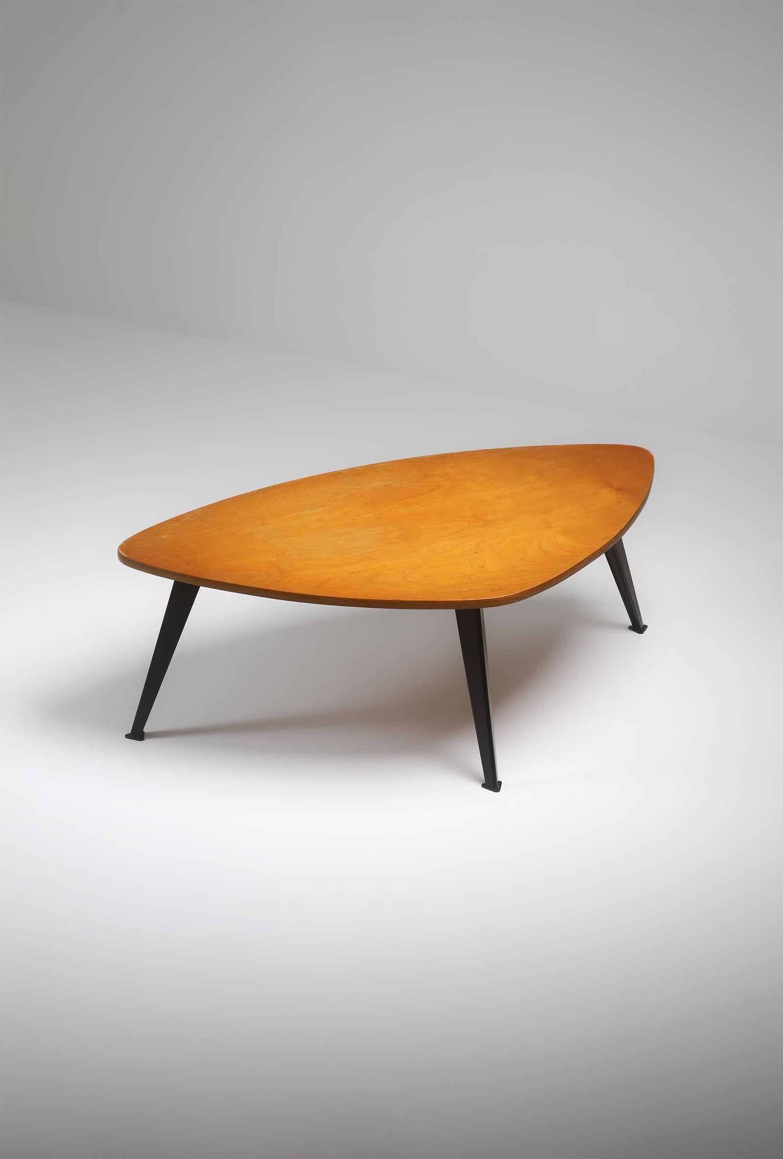This coffee table dates back from the 50s and are rare finds in the category of Belgian furniture designs.