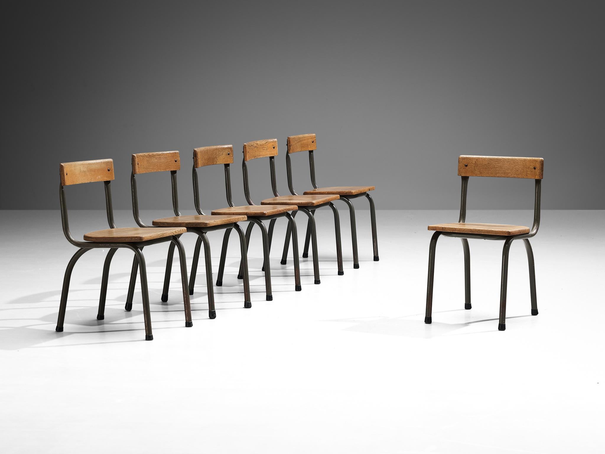 Willy Van Der Meeren for Tubax, set of six chairs, metal, oak, Belgium, 1957.

This set of Industrial chairs is designed by the Belgian designer Willy Van Der Meeren. The exceptional elements of these chairs is the fact that they are made of solid