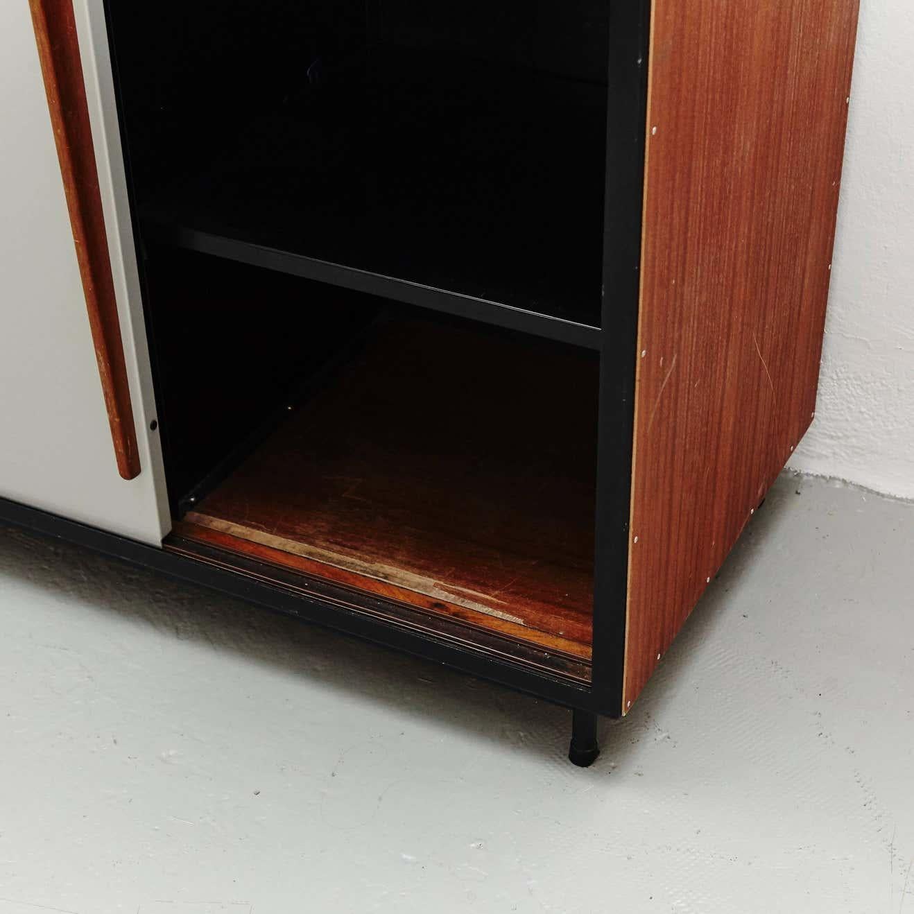 Cabinet designed by Willy Van Der Meeren and executed circa 1950 for Tubex.

In good original condition, preserving a beautiful patina, with minor wear consistent with age and use.

In the style of Jean Prouvé.

Willy Van Der Meeren Born in