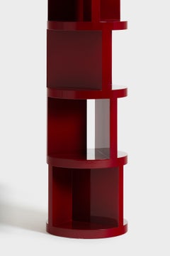 Wilma red bookshelf in metal and liquid ceramic by Matteo Cibic
