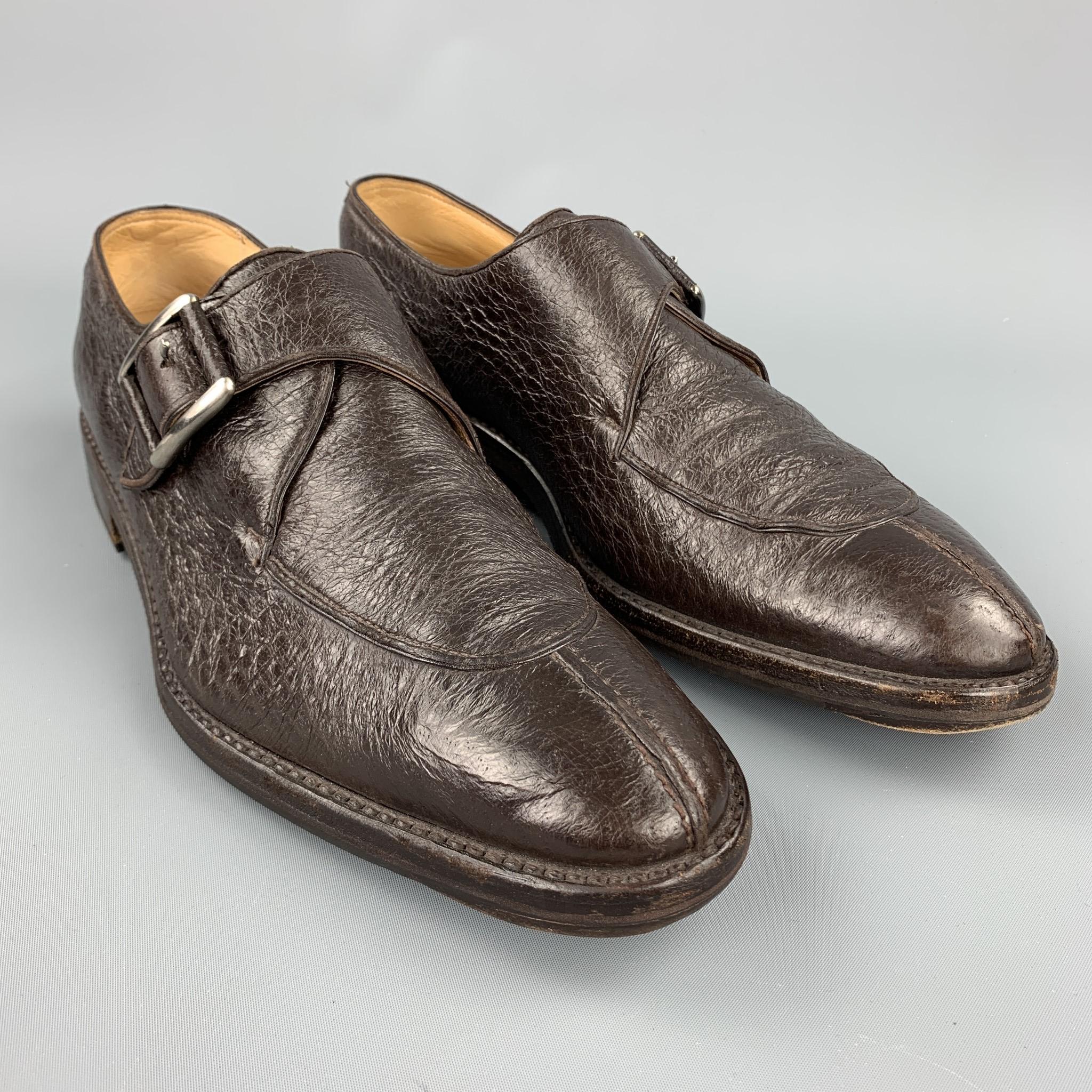 WILSON and DEAN for WILKES BASHFORD loafers comes in a brown textured leather featuring a monk strap with a wooden heel. Made in Italy.

Very Good Pre-Owned Condition.
Marked: 9.5

Outsole:

12 in. x 4 in. 

SKU: 103735
Category: Loafers

More