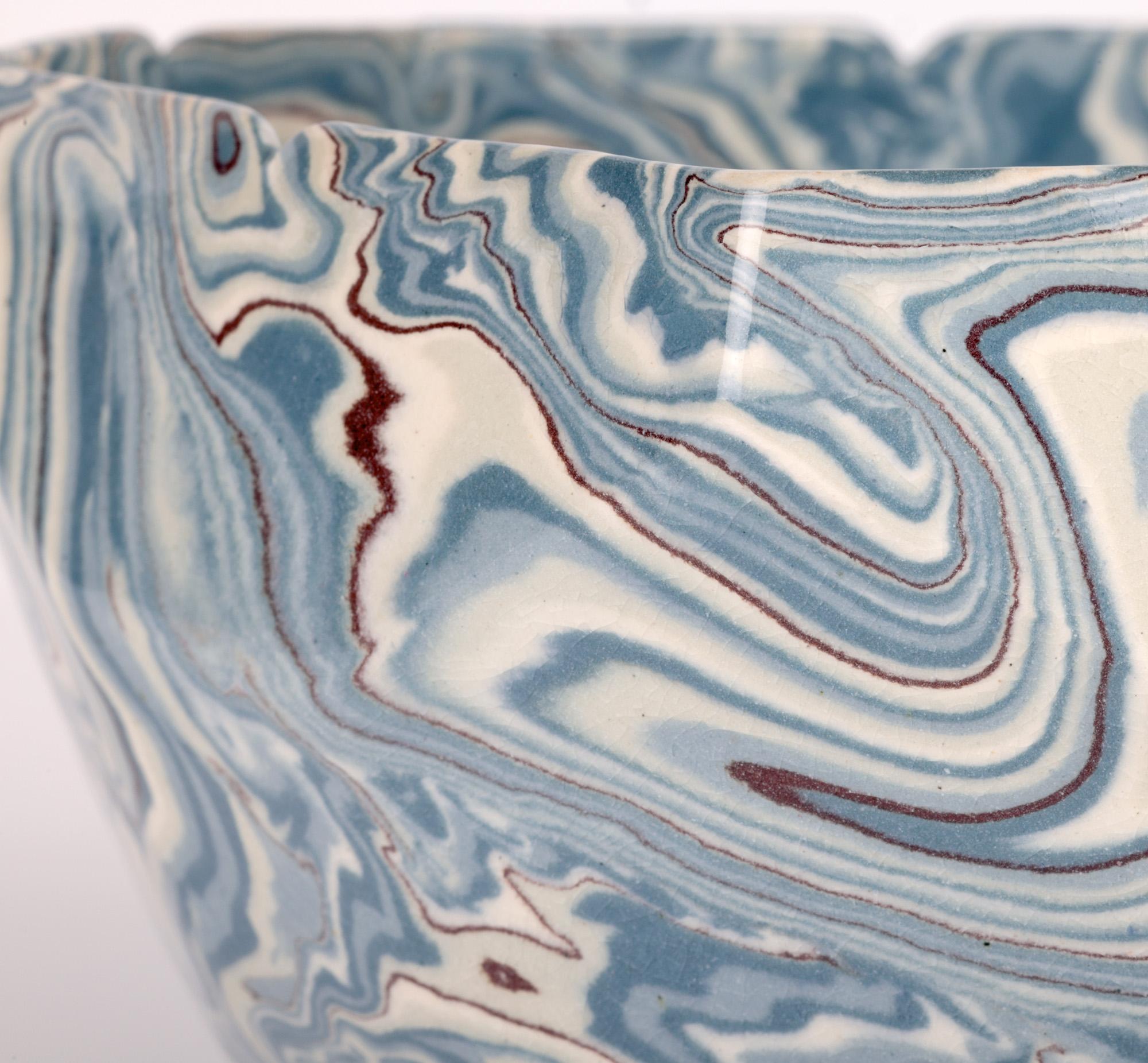 A rare and very stylish Doulton Lambeth Marqueterie Ware blue marbled art pottery bowl by Lambeth’s first Art Director Wilton Parker Rix (Doulton Lambeth 1868-1897) and dating from around 1895. 

Rix became a trainee manager at Doulton Lambeth in