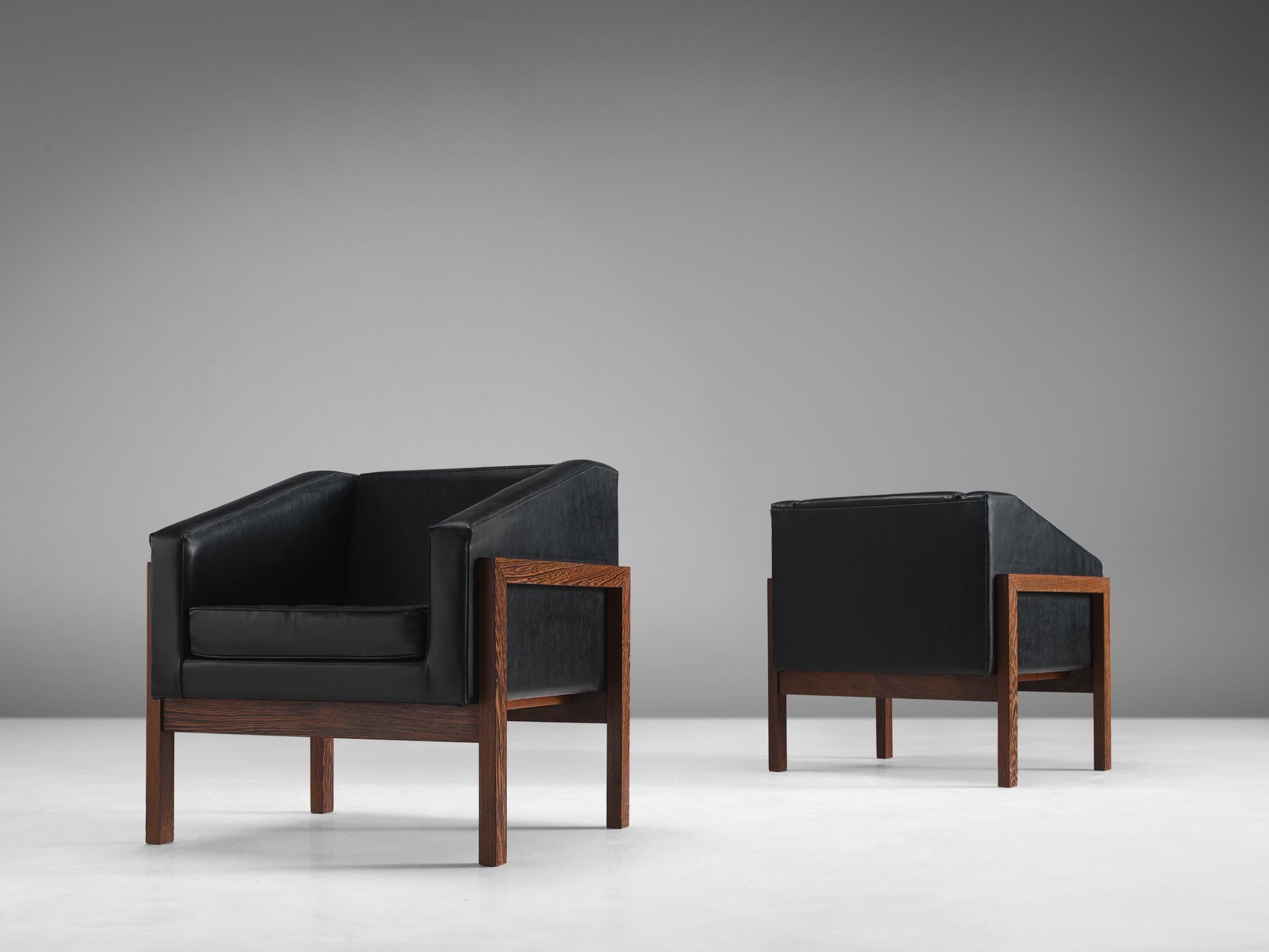 Wim Den Boom, pair of lounge chairs, black faux-leather, wengé, Netherlands, 1960.

These chairs was designed by Wim Den Boon as part of an office interior in Den Haag. The chair bears strong traits of the aesthetic language of Le Corbusier. The