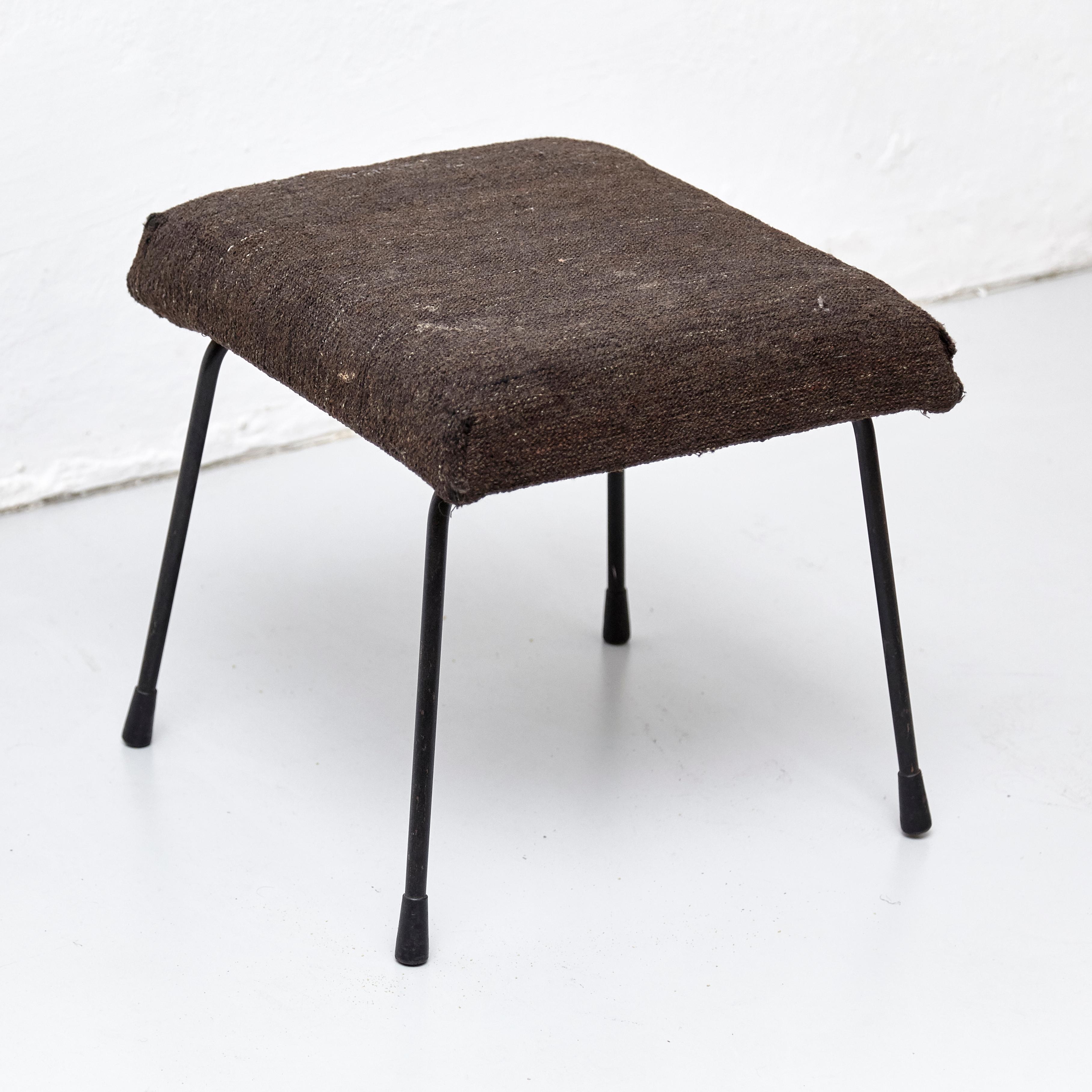 Footstool designed by Wim Rietveld circa 1960 manufactured in Netherlands

In original condition, with minor wear consistent with age and use, preserving a beautiful patina.

Some scratches in the fabric.

 