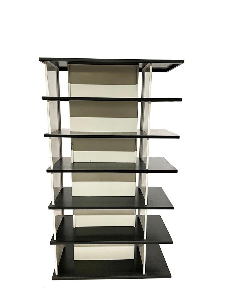 Wim Rietveld room divider bookcase, 1960s 

A metal black and cream white bookcase, which can also be used as a room divider. Sleek model, which was made by designer Wim Rietveld in the 1960s and was sold in the Dutch store 