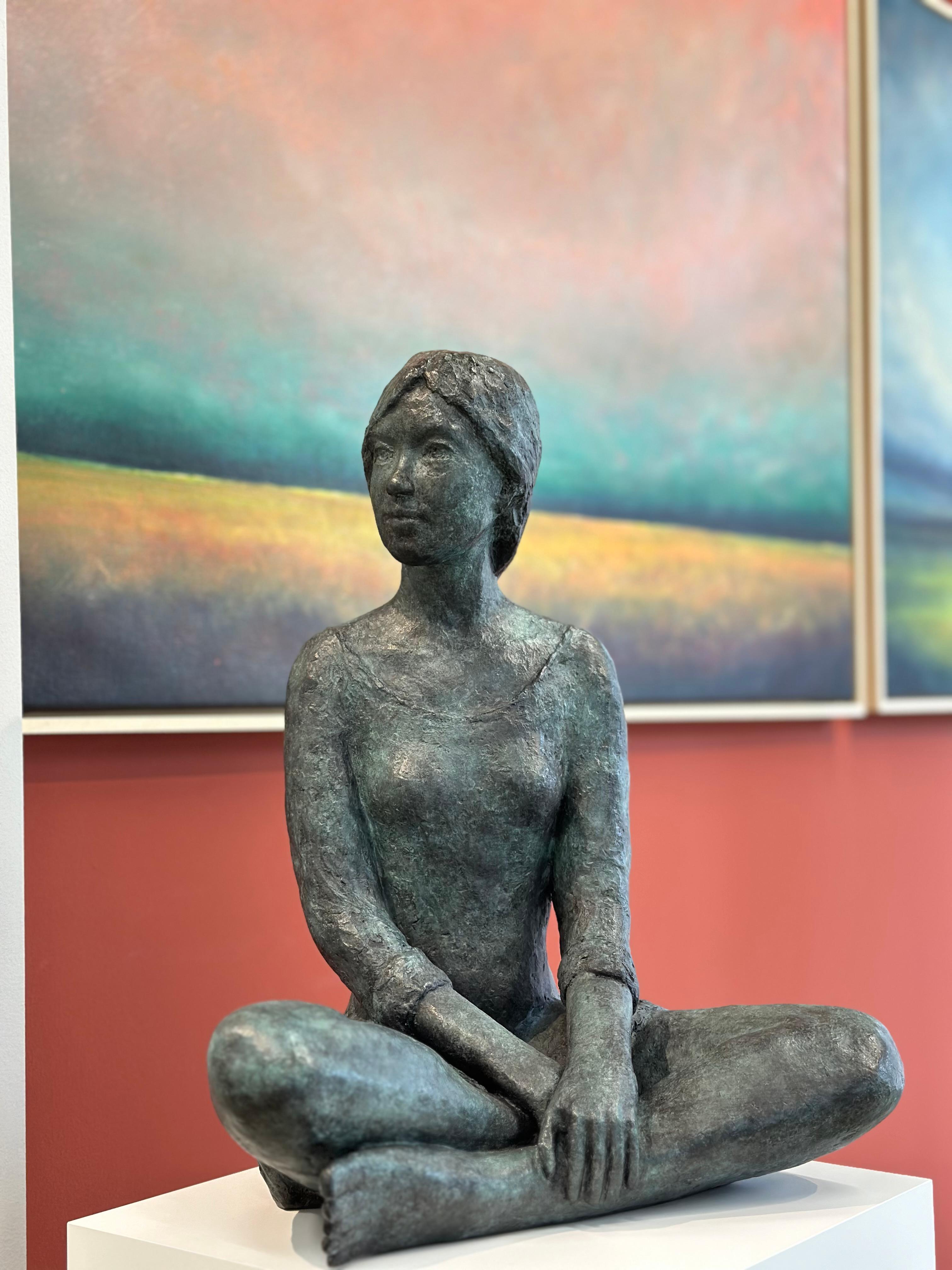 Sandra
45 x 34 x 24 cn
Bronze

The theme van der Kraan likes most is to show the growing of young girls. Living in their own world. Like this girl watching something she likes. The narrative sculptures show 'the woman' and 'the girl' withdrawn into