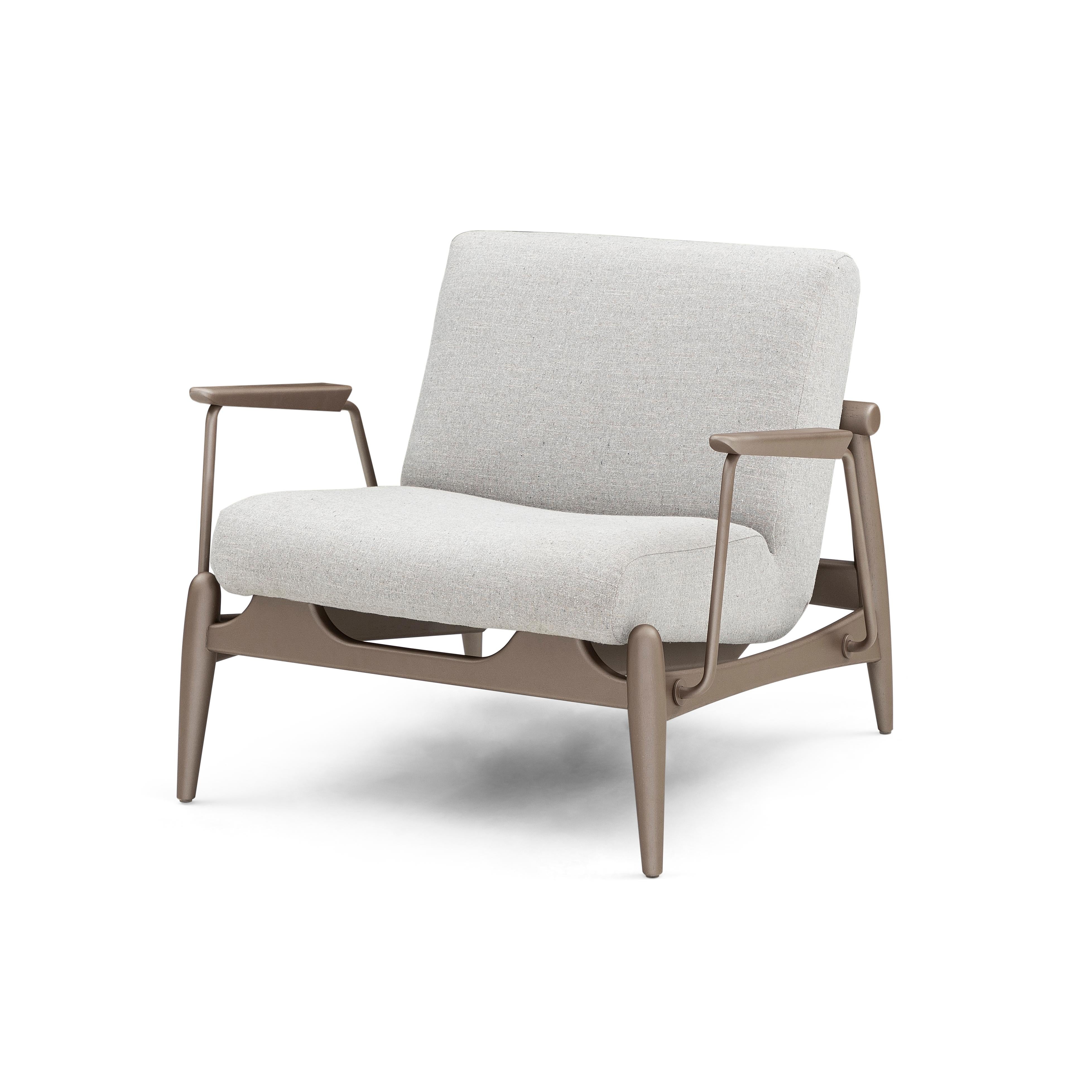 The Win armchair features metal trimmings with a brown wood finish frame, wrapped in a beautiful light gray fabric. Our amazing Uultis design team has created this armchair for your comfort and support, that you can place in any room of your house.