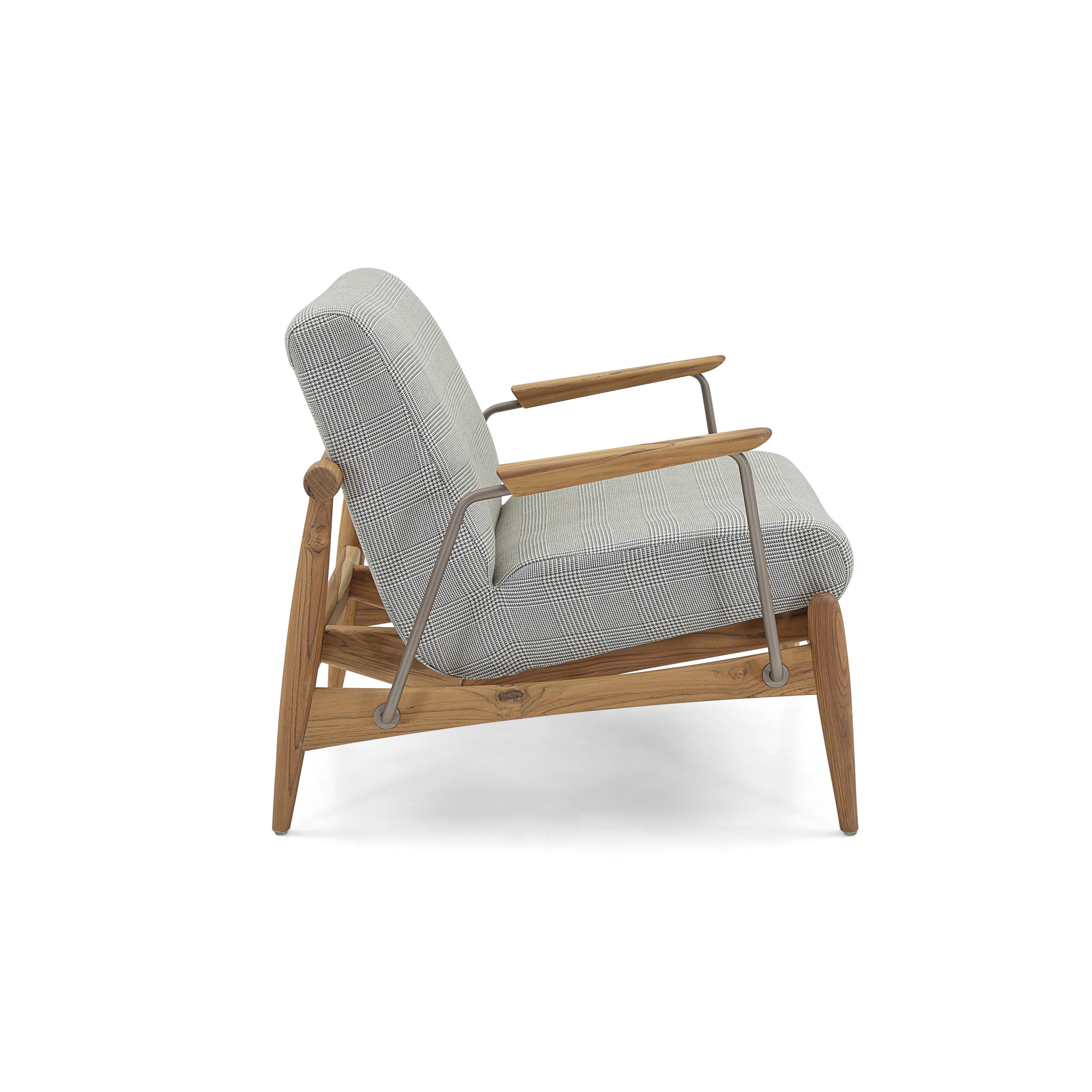 The Win armchair features metal trimmings with a teak wood finish frame, wrapped in a beautiful plaid fabric. Our amazing Uultis design team has created this armchair for your comfort and support, that you can place in any room of your house. It is