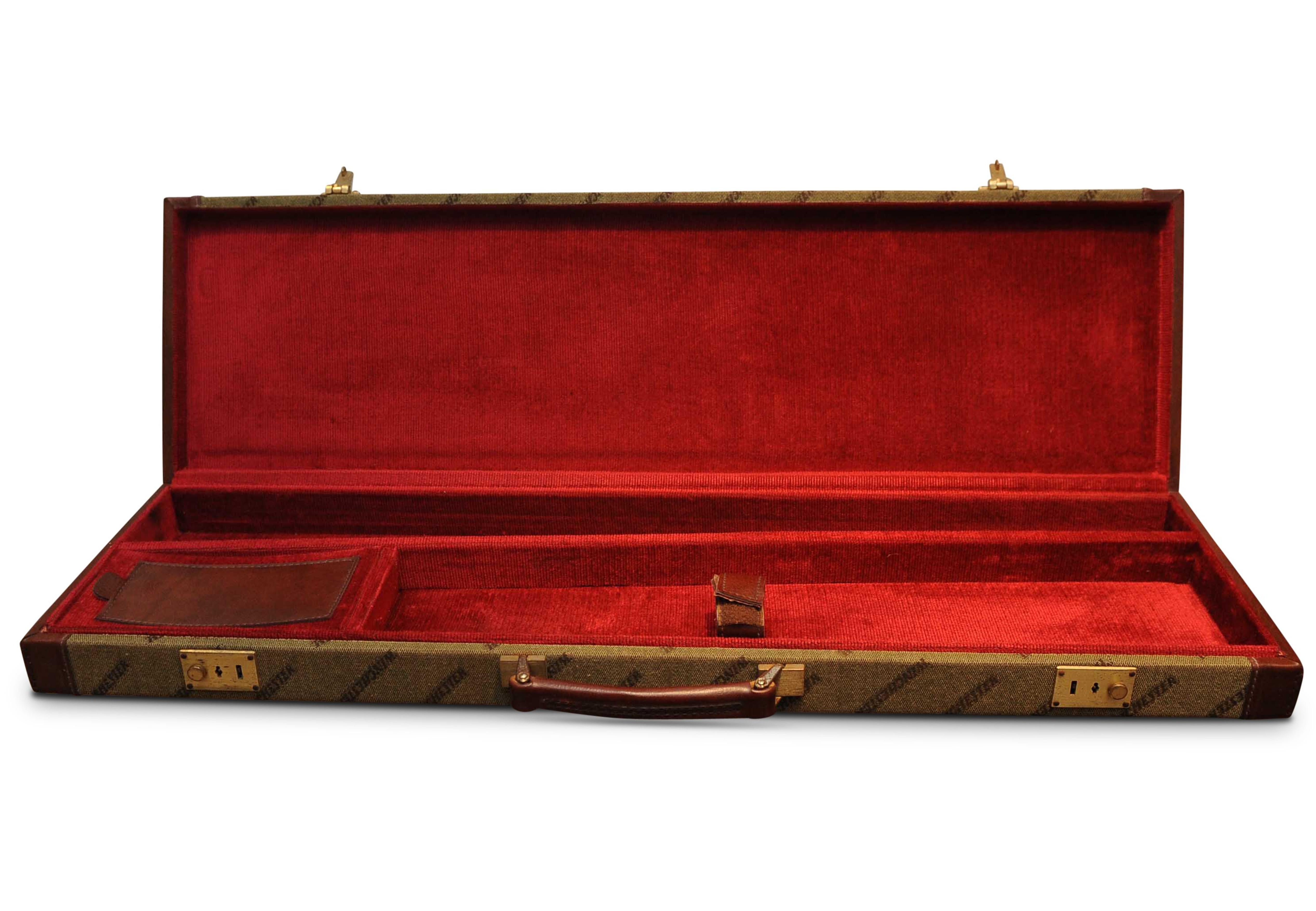Winchester 4692 Embossed Hard Gun Case with Leather Handle Finished Brass Trim & Red Velvet Interior. 

Winchester rifle is a comprehensive term describing a series of lever action repeating rifles manufactured by the Winchester Repeating Arms