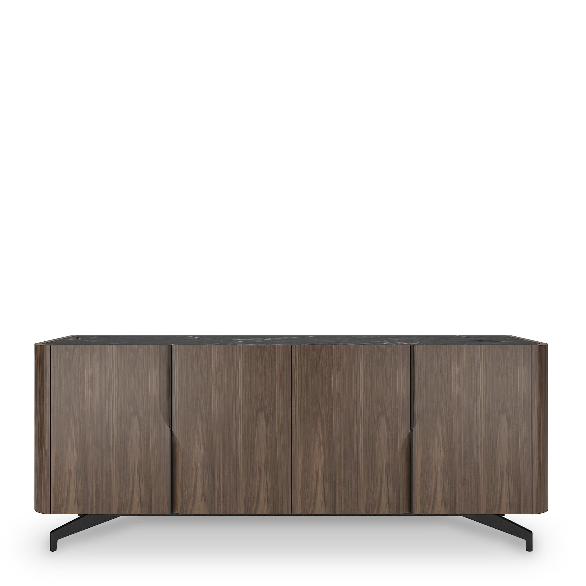 The Wind sideboard, which is 100% produced in Portugal (Europe), creates a beautiful contrast by combining the round movement of curved and smooth wood veneer lines with completely integrated metallic handles. 

Designed by the French product