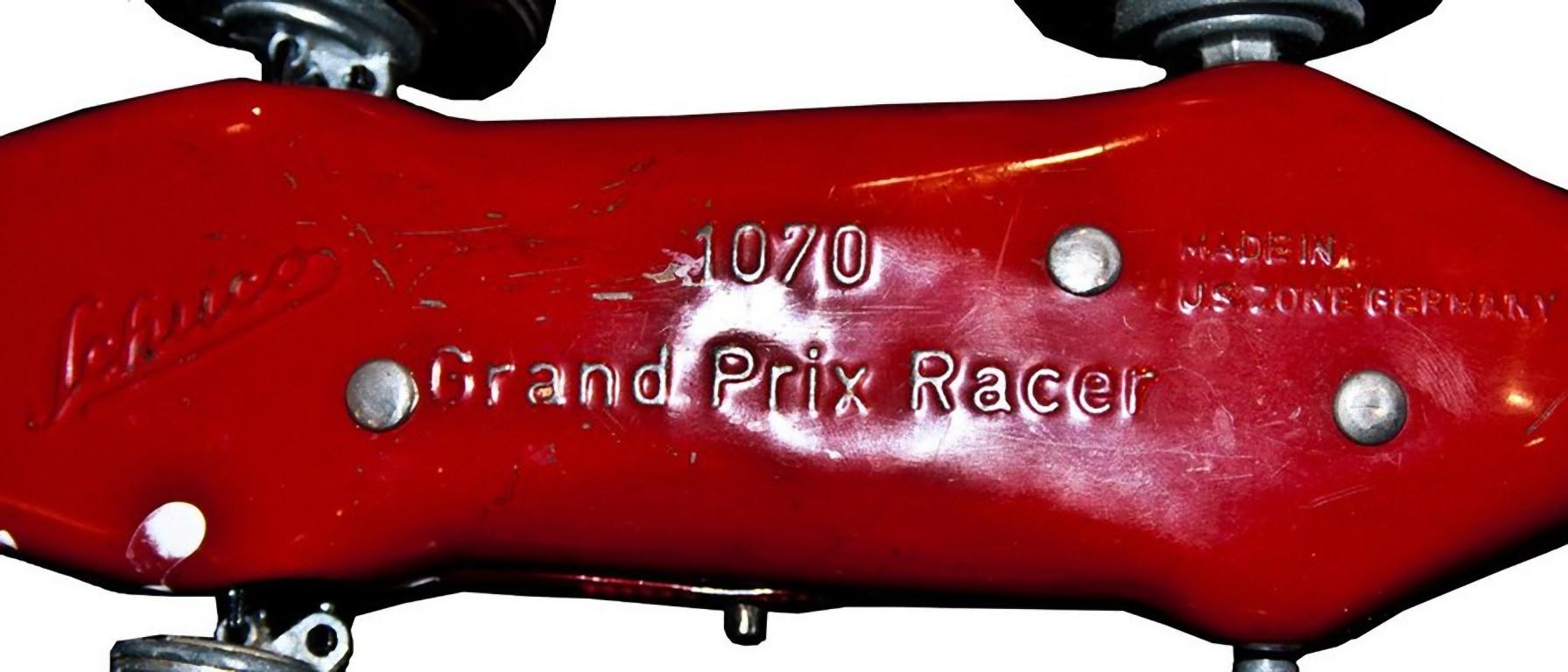This Wind up Schuco Grand Prix Racer 1070 car is an original mechanical toy, made in 1950s.

Vintage wind up mechanical toy car.

Made in U.S. zone Germany by Schuco in 1950s.

Model N. Grand Prix Racer 1070.

Made in tinplate with rubber