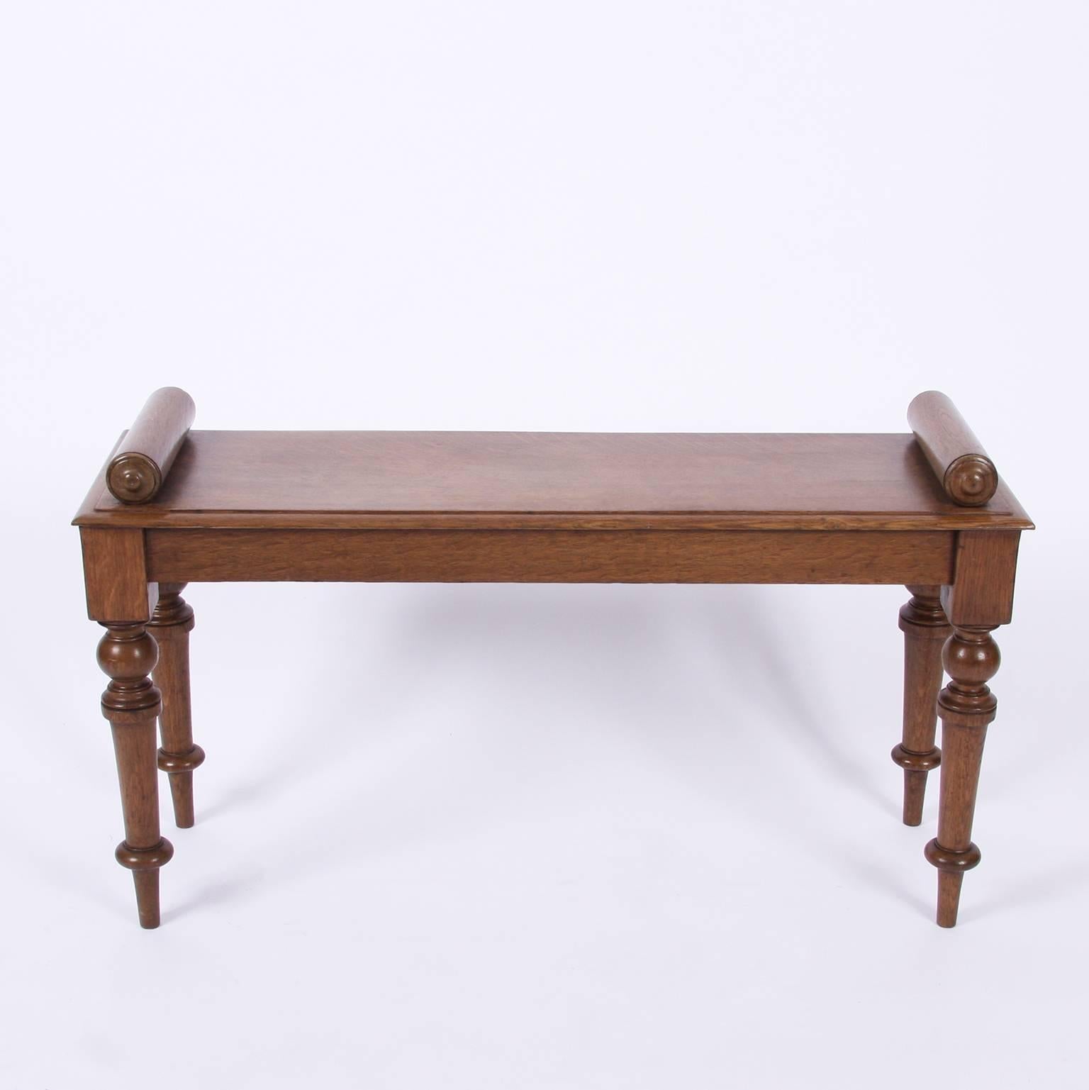 English, 19th century

A charming oak window seat with wooden bolsters.