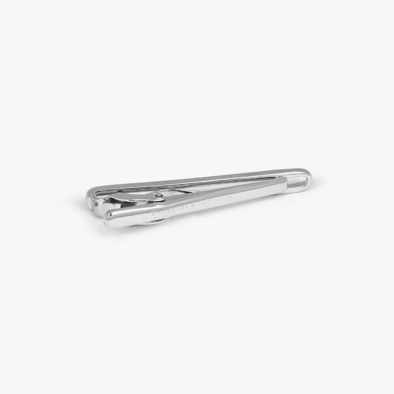 Window Tie Clip with Rhodium Finish

The cut out centre reveals your tie pattern, incorporating your look into our design. A unique and modern twist on our classic tie clip collection. Finished in highly-polished, rhodium plated base metal. The tie
