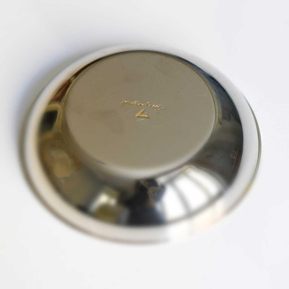 Windproof Ashtray made in nickel-plated brass with signature on the bottom.
Design and Production: Gabriella Crespi
Date of creation: 1973. 
Posted in the Gabriella Crespi Archive at No. 100439044