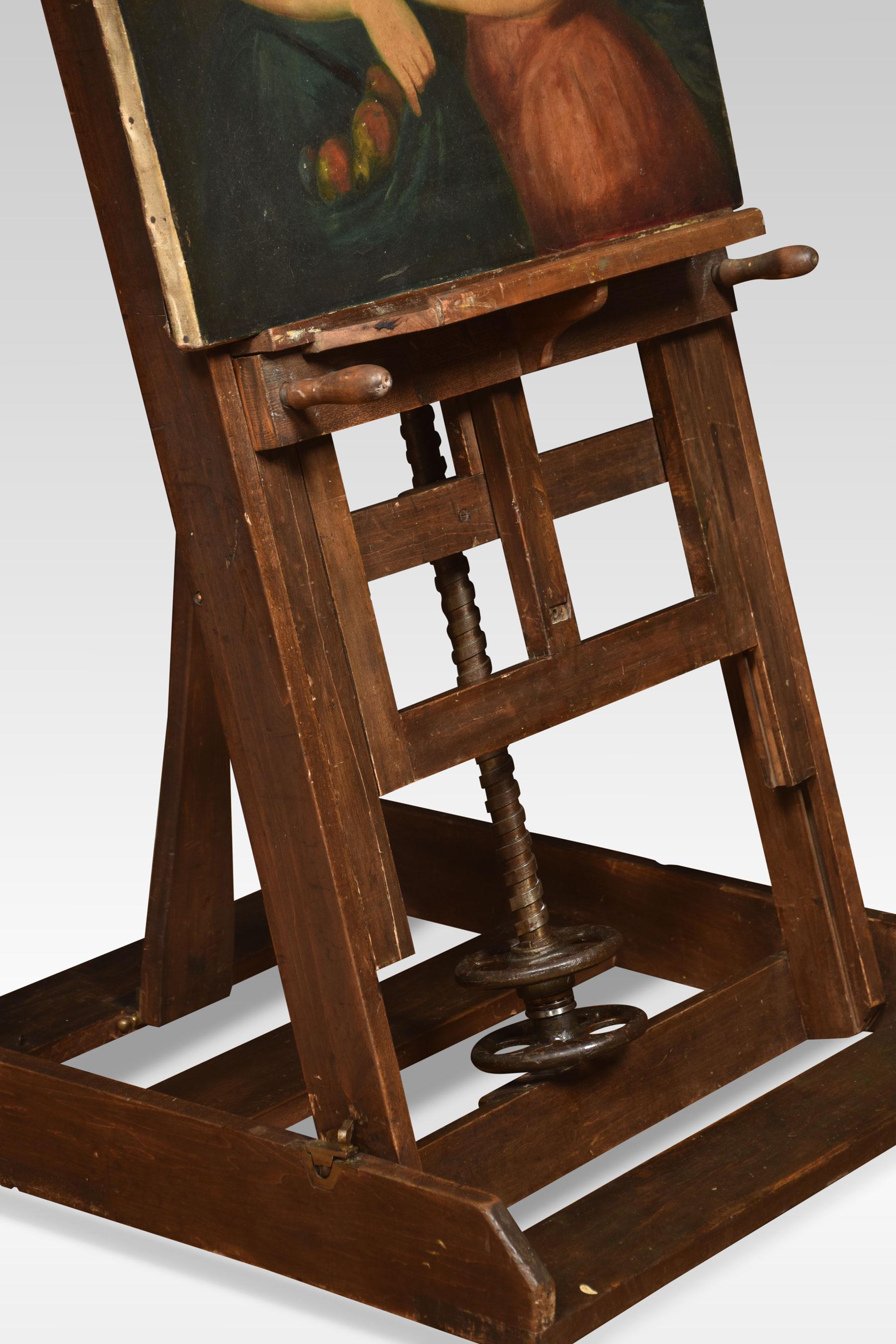 Windsor and Newton fully adjustable artist’s easel. This easel has a back and forth tilt adjustment, and its height can be adjusted by two separate winding wheels which are working perfectly. All raised up on trestle base terminating in original