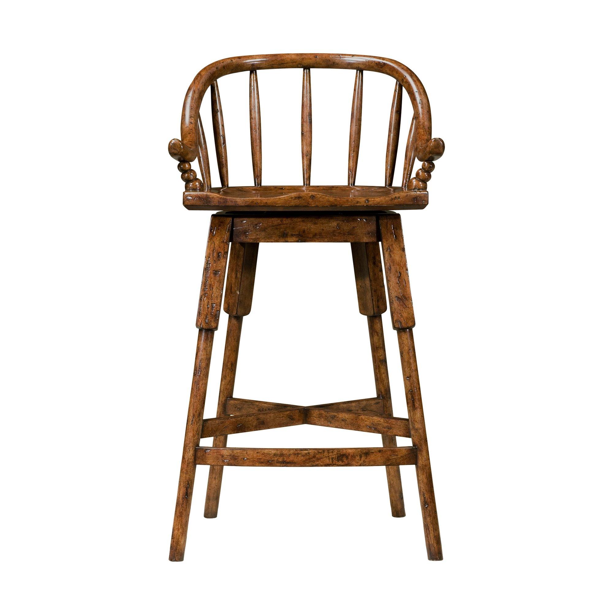 A mahogany swivel bar stool, the scoop back with turned slats enclosing a molded seat, on square and turned legs joined by stretchers.

Measures: 40.5” H, 21.75” W, 19.75” D
Seat height 29 inches
Arm height 33.25 inches.
 