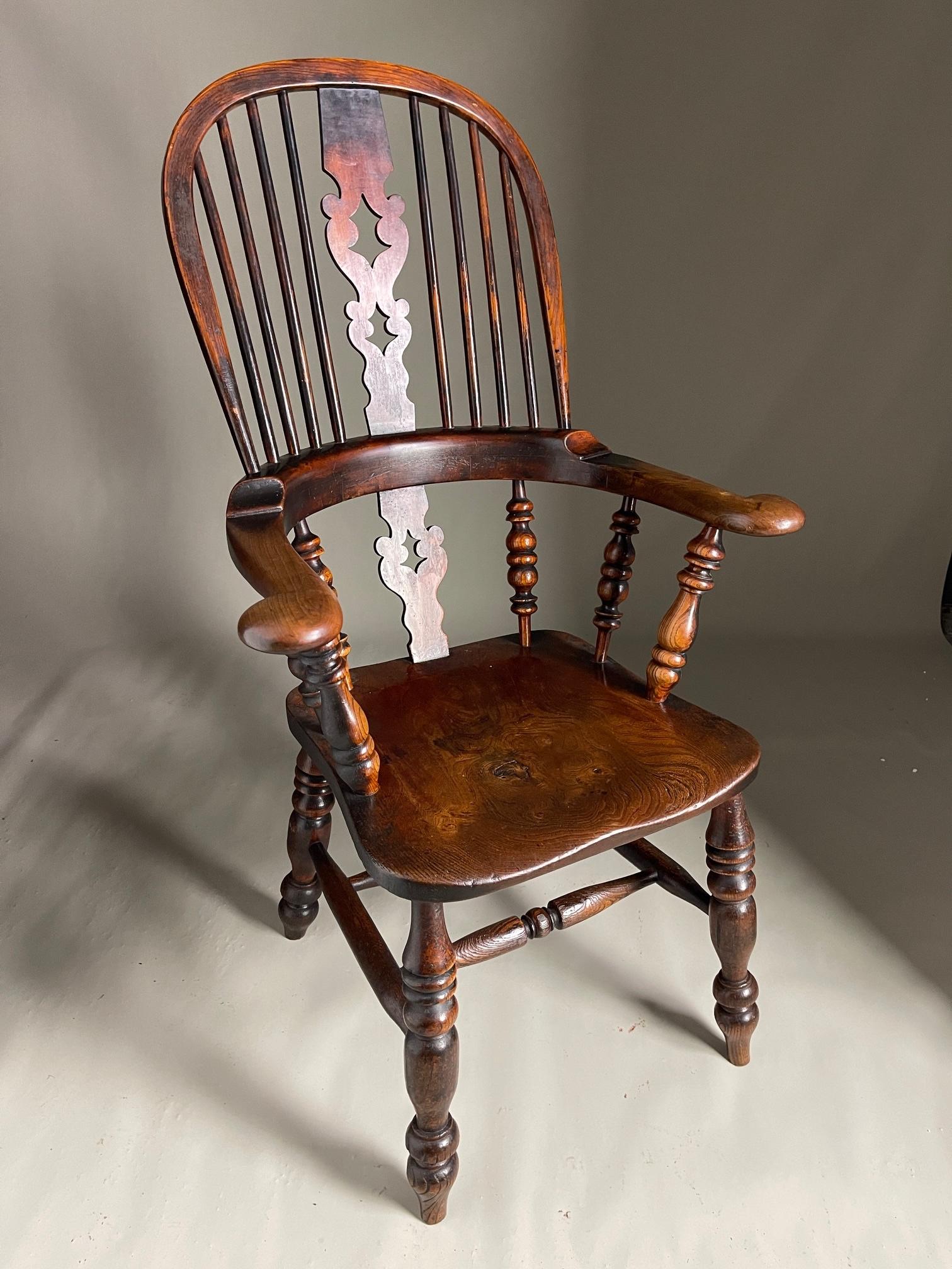 Windsor chair English c1840 in excellent condition with broad arms and very good colour 

116cms high 
67cm across arms
65cms deep
 seat 47cms 
