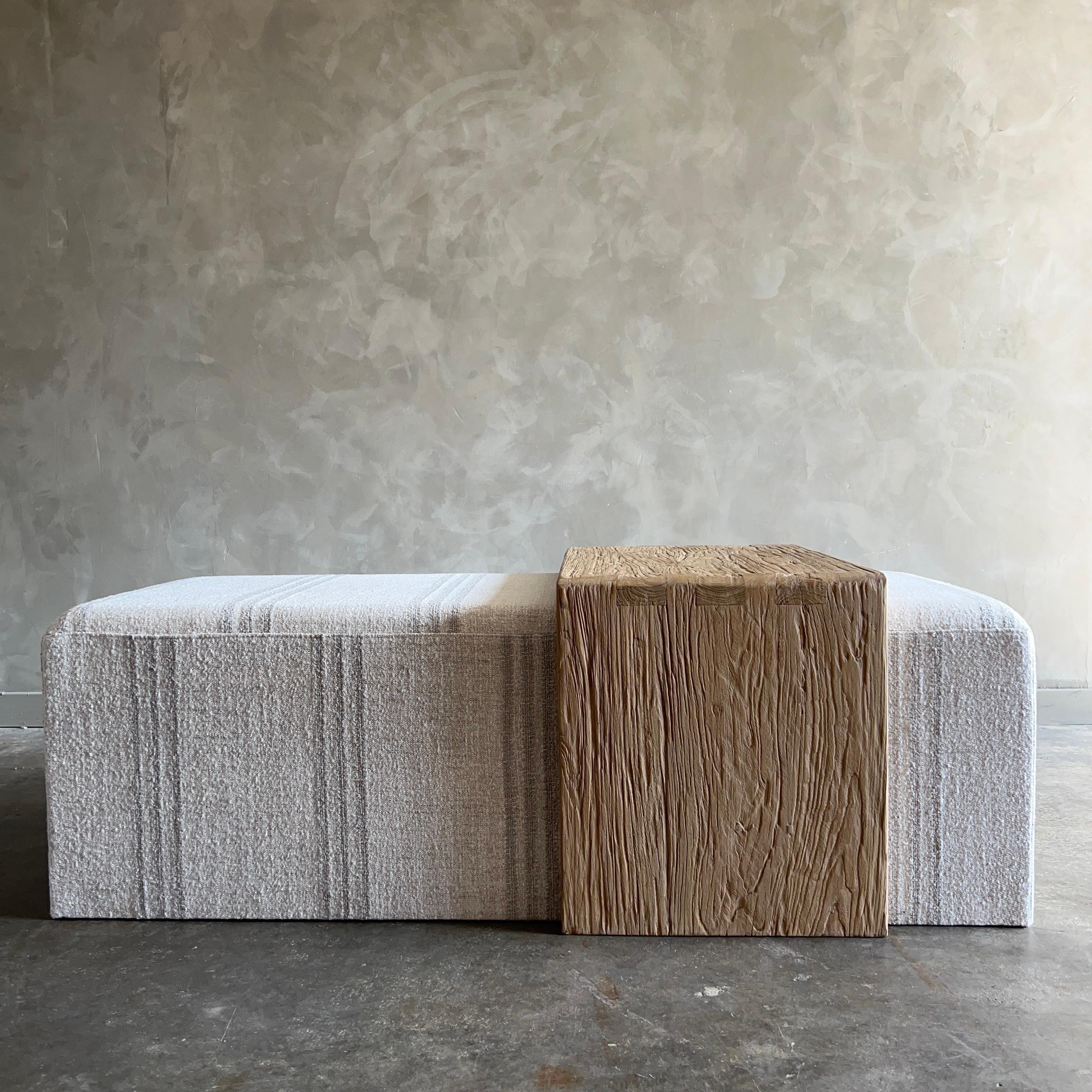 Windsor Cocktail Ottoman with Elm Wood Table 
Our cube ottoman is upholstered in a beautiful linen with flax linen stripes. A light oatmeal color with flax, dark natural stripes give this a vintage style.  The hand-crafted solid elm wood waterfall