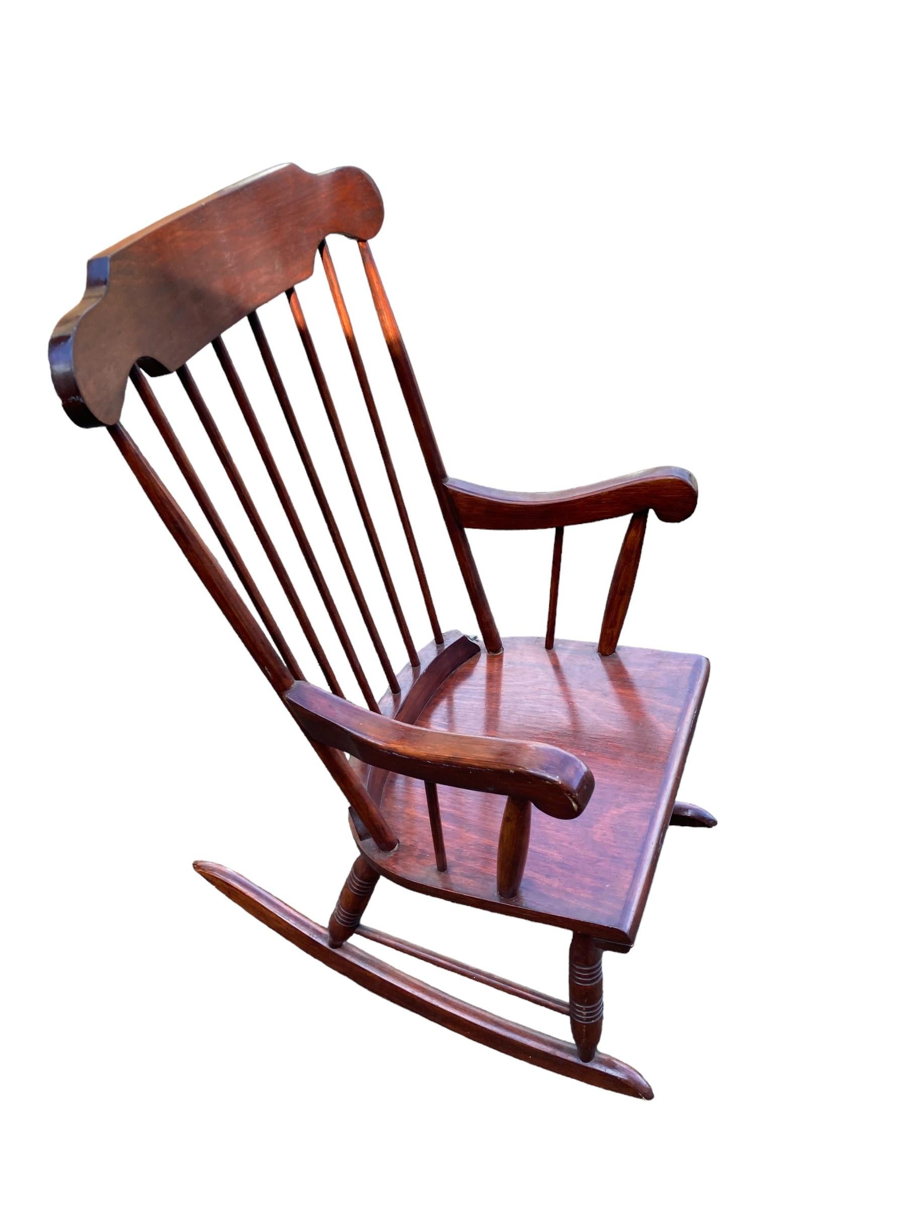 Windsor style rocking chair dating from around 1950's in Mahogany good and sturdy condition
H: 101cm
W: 60cm
D: 43 cm
SH: 43cm
Rocker Depth: 75cm