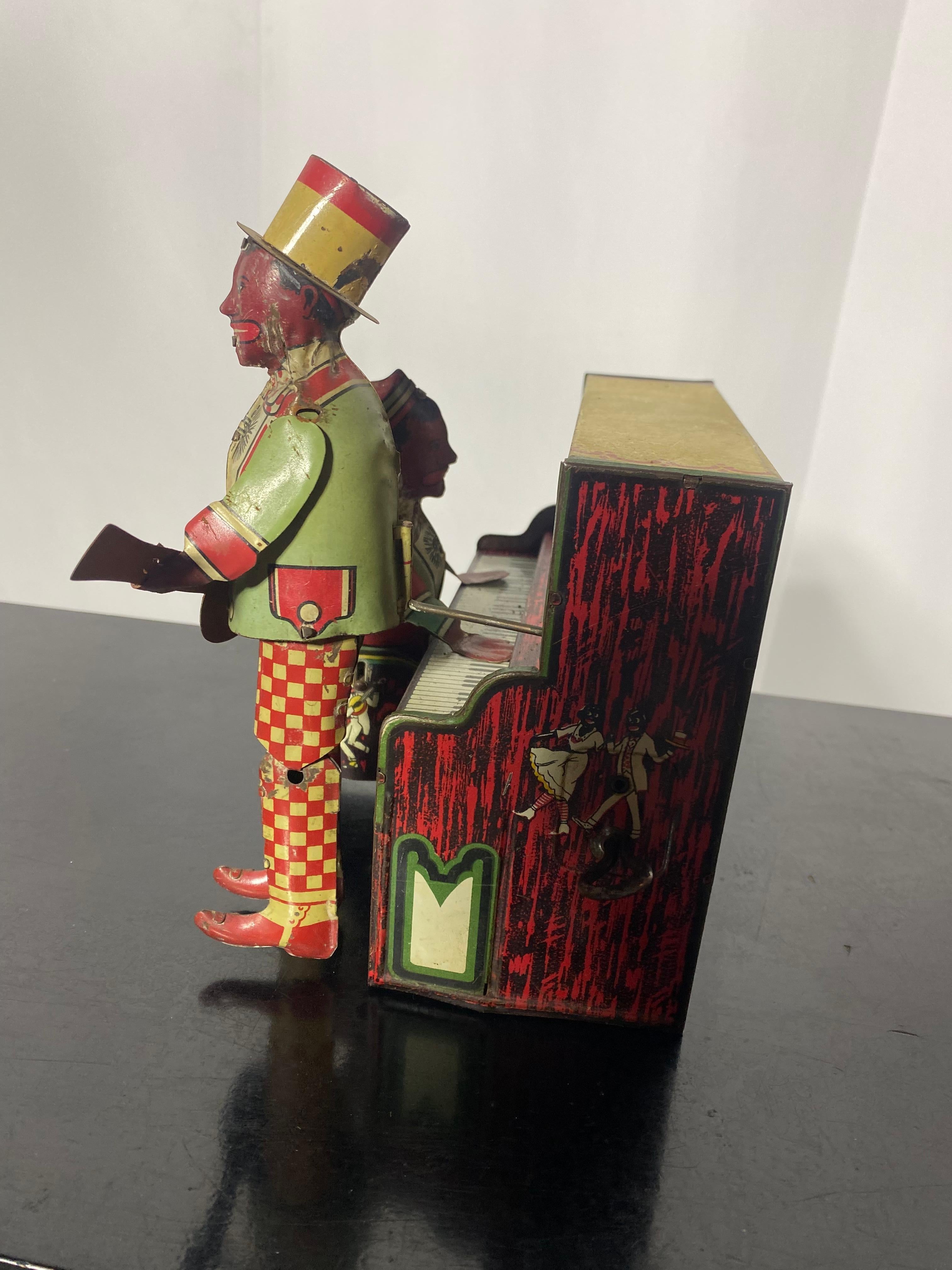 Windup Ham and Sam “The Minstrel Team” Tin Litho Toy c.1921, ,  Piano / banjo In Good Condition For Sale In Buffalo, NY