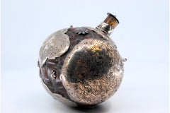 Wine-barrel perfume bottle silver-coated with plant engravings