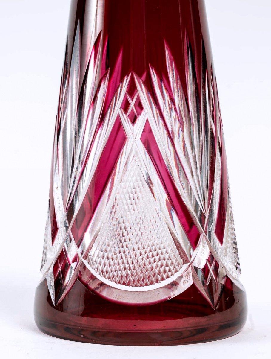 A beautiful cut crystal decanter with red lining, model 