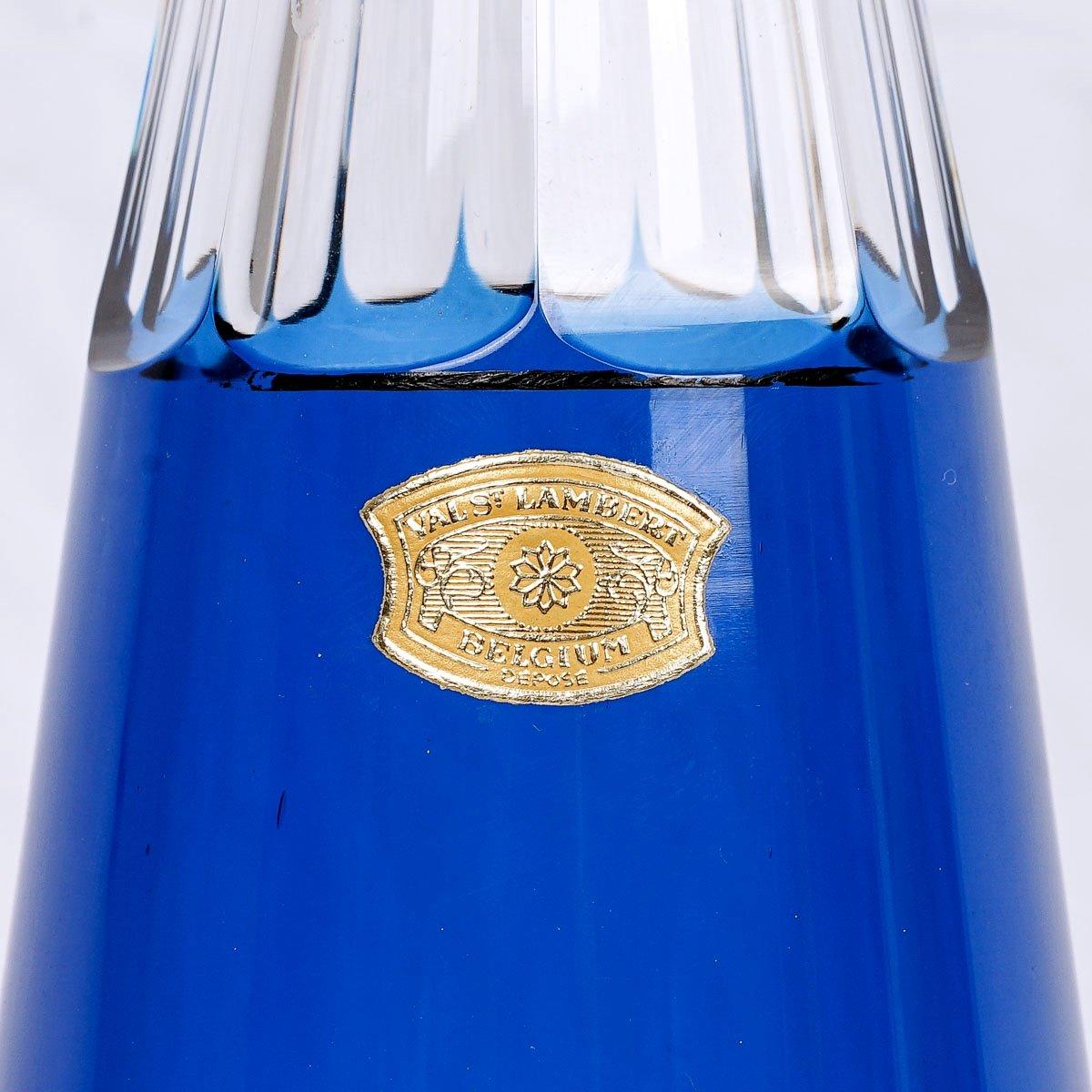 This is a delightful blue-lined cut crystal decanter, the 