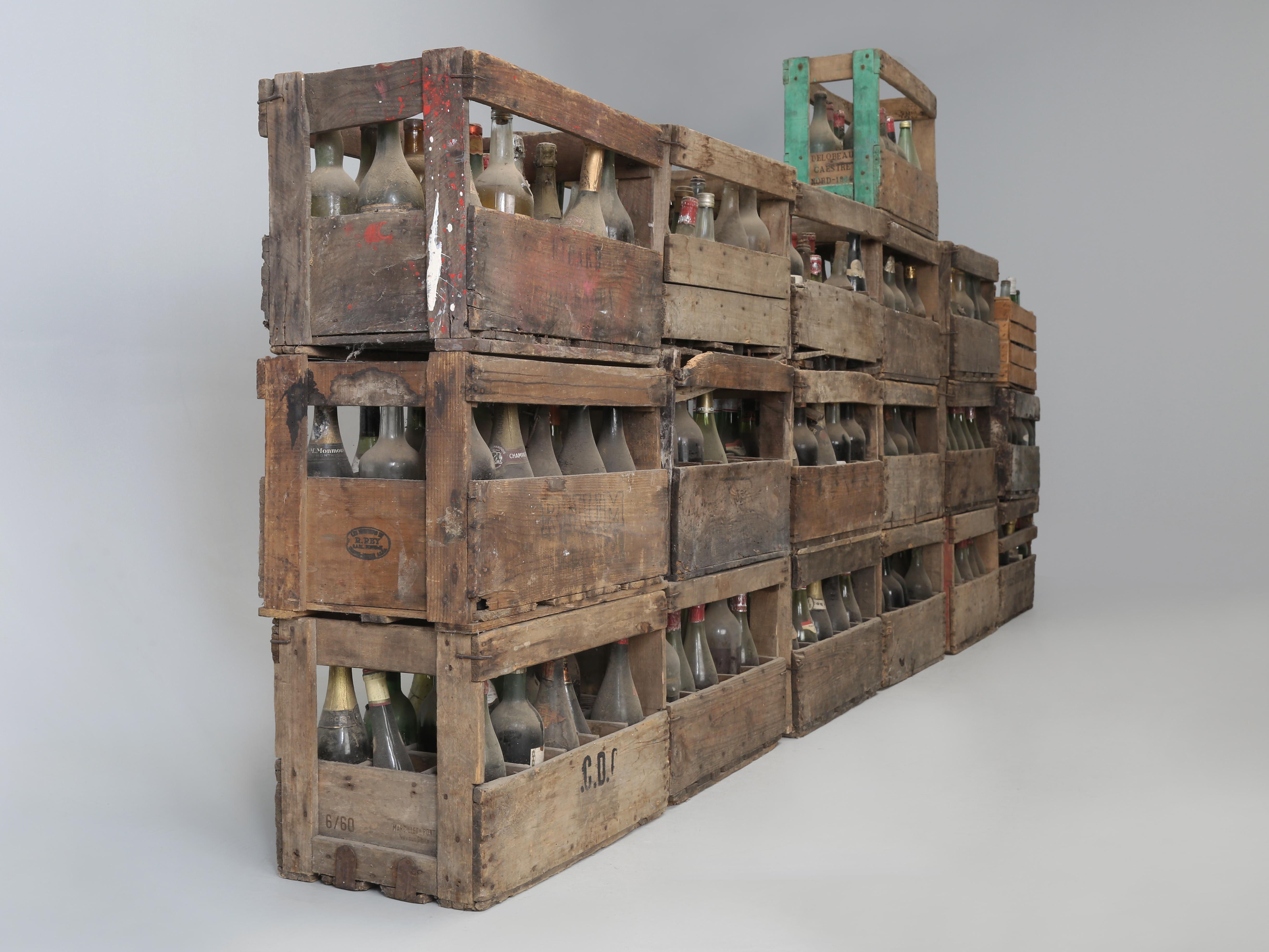 Authentic Old French Wooden Wine Crates and what better way to decorate one's Wine Cellar than with (19) Cases of Vintage Wine, which is absolutely not consumable.  We purchased the Set of (19) Wooden Crates of Vintage Wine in Toulouse, France and