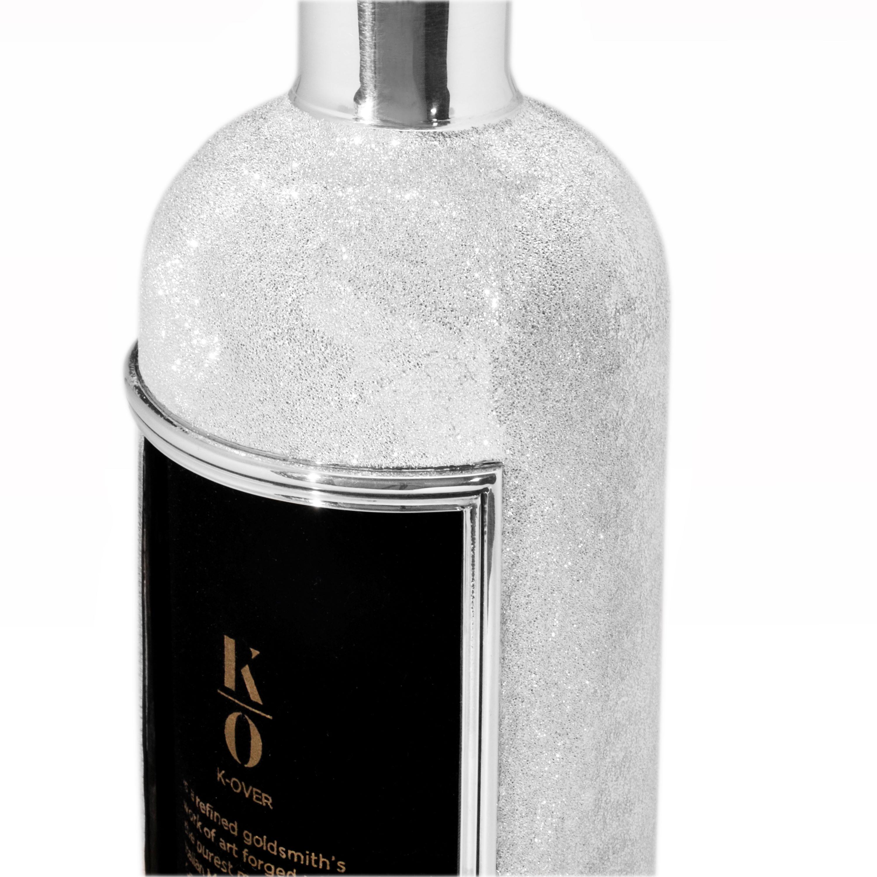 Usually used for your special wine bottles, this K-OVER allows you to show the labels of your favorite wines.

As it can be clearly seen from the pictures, the surface of the K-OVER shines as the moon. This innovative texture provides also a