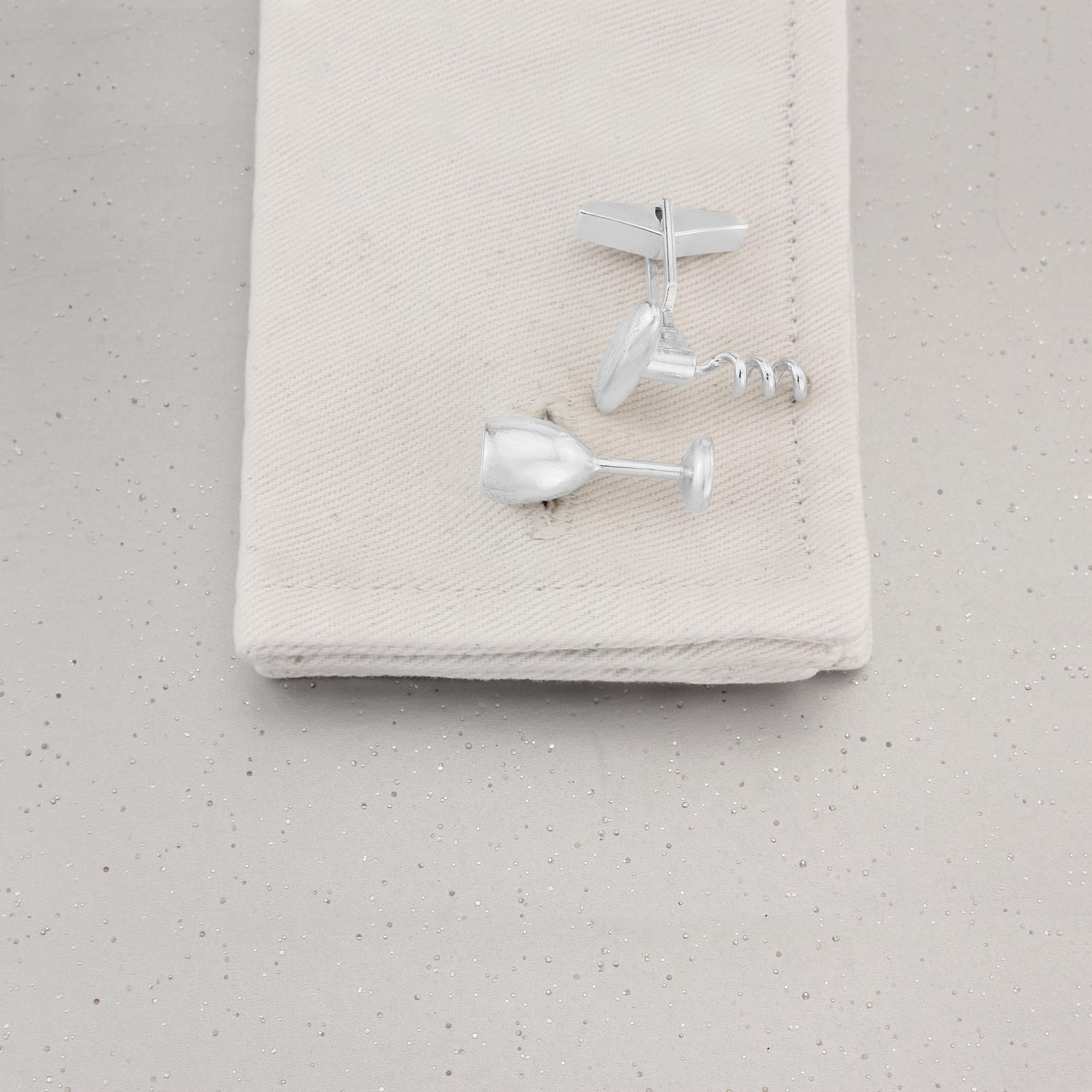 
These unusual wine glass and corkscrew cufflinks are made in solid Sterling Silver, using higher grade swivels for utmost quality.

This original design will not fail to delight the discerning, sophisticated gentleman with a penchant for a glass of