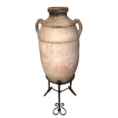 Antique Wine Jar with Forged Iron Base