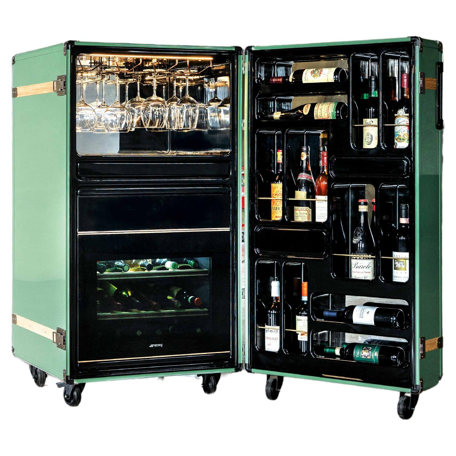 Wine is said to be the poetry of the earth. Wine Trunk holds its rarest scents and most exotic aromas: a wine cabinet with romantic style and timeless elegance, designed to store the finest wines and spirits, carefully preserving their aroma. A