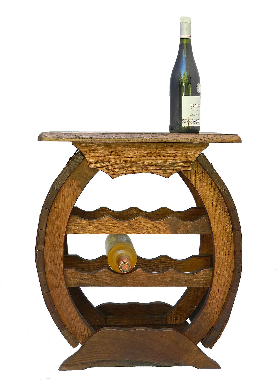 Wine rack table oak midcentury vintage
Unusual faux barrel design
Practical and decorative
Will take ten bottles
Good vintage condition with only minor marks of use and age.







    