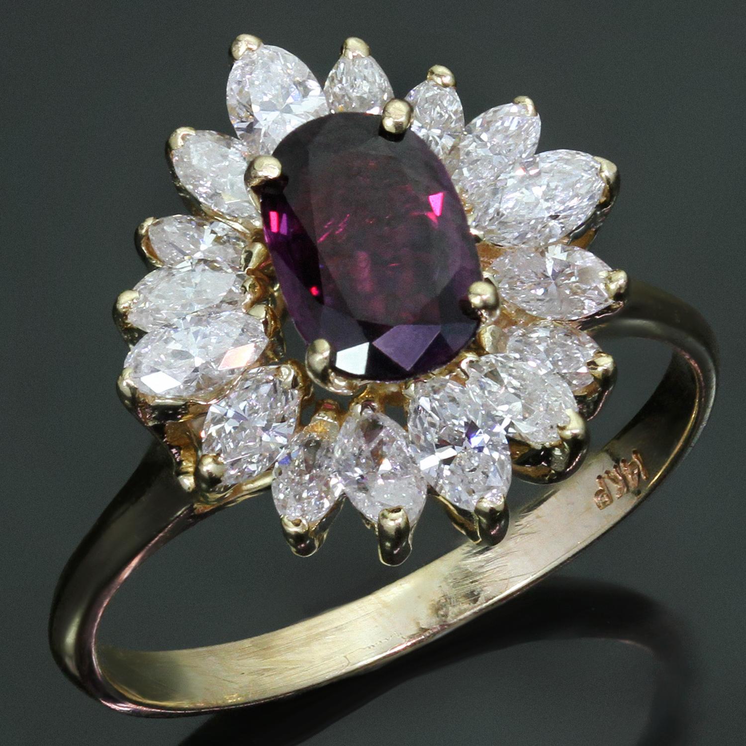 This stunning retro ballerina ring is crafted in 14k yellow gold and features a genuine purplish wine red oval garnet measuring 5.0mm x 7.0 mm and weighing 2.0 carats, surrounded with marquise-cut H-I SI1 diamonds weighing an estimated 1.25 carats.