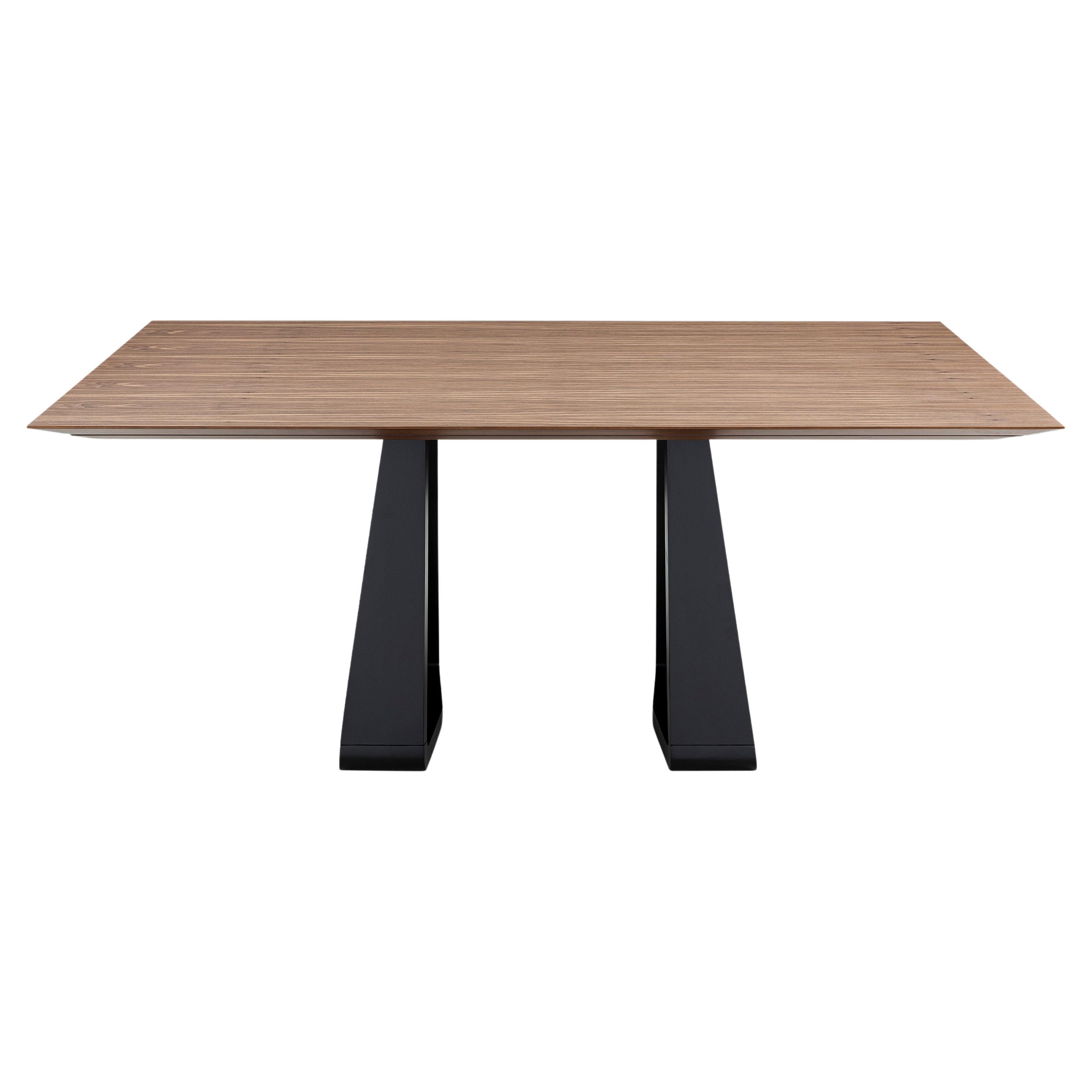 The Wing dining table is a beautiful chamfered piece in a walnut veneered table top and a minimalist graphite black base. Combining all these details the amazing Uultis team has created this dining table for any type of decor at your home because of