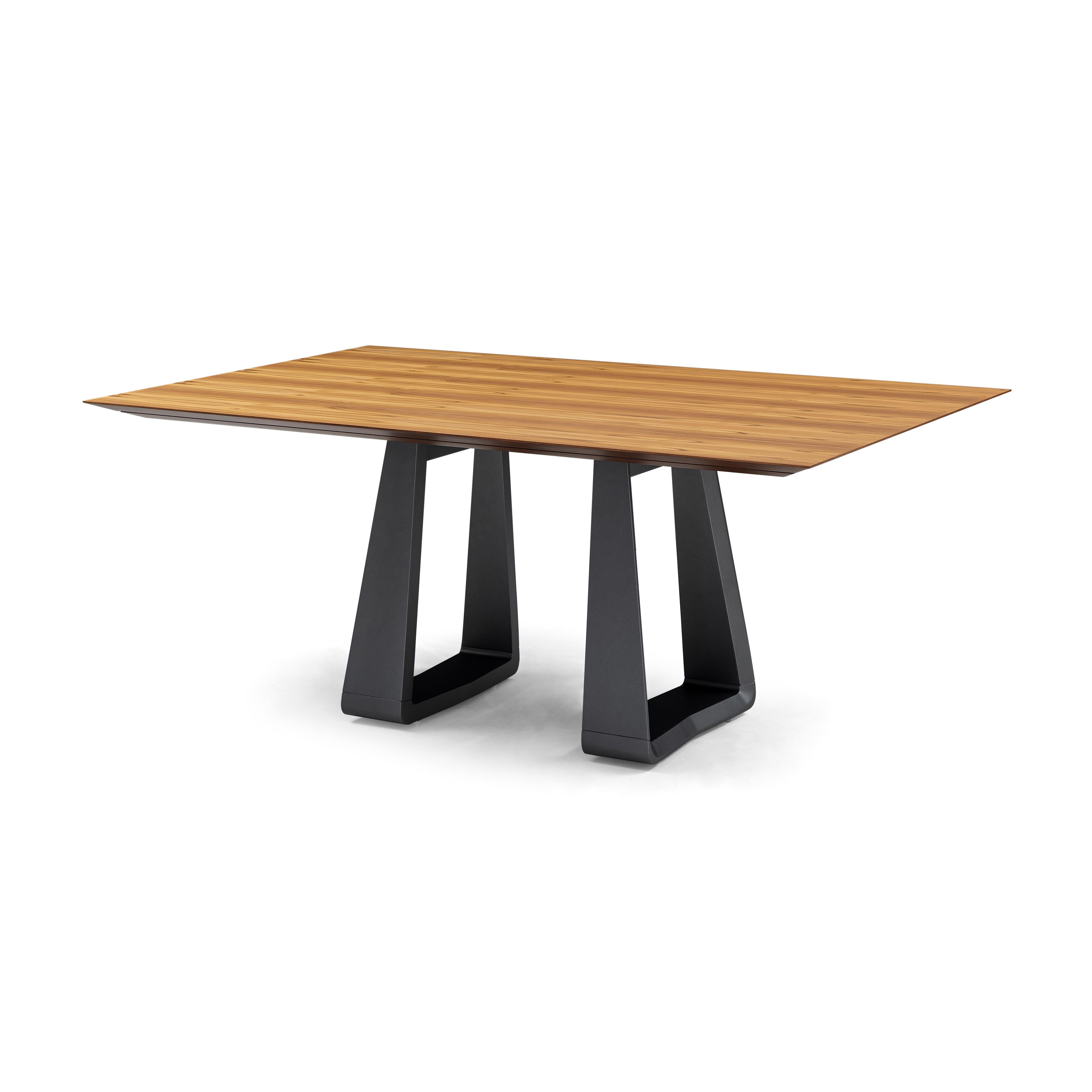 The Wing dining table is a beautiful chamfered piece in a teak veneered table top and a minimalist graphite base. Combining all these details the amazing Uultis team has created this dining table for any type of decor at your home because of its