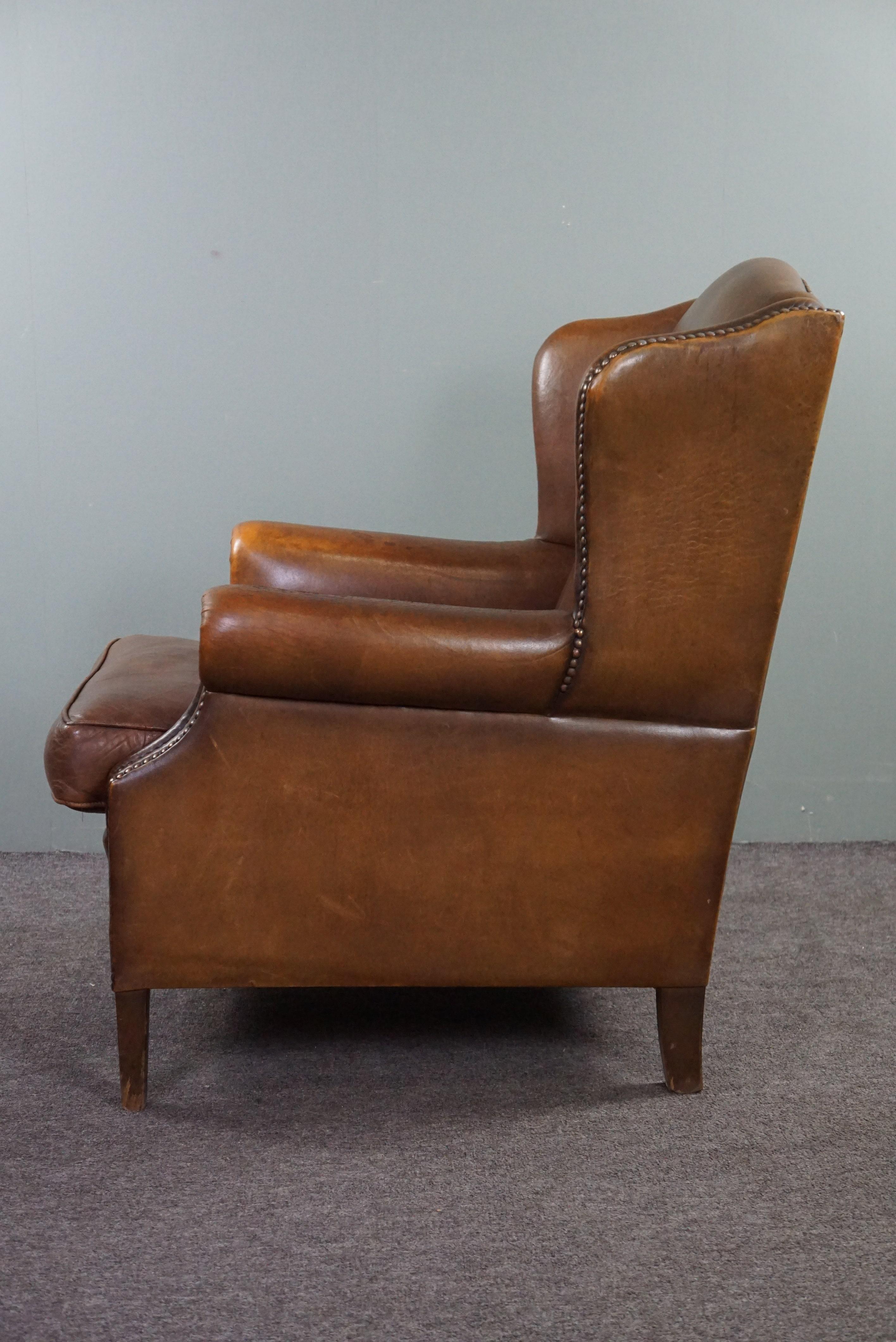 Wing armchair full of character, made of sheep leather In Good Condition For Sale In Harderwijk, NL
